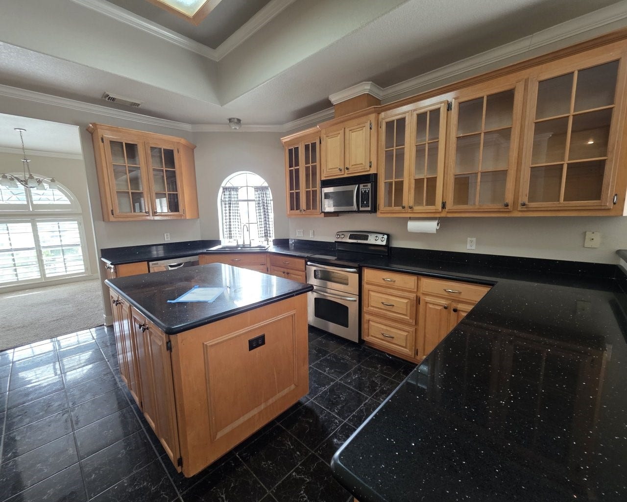 Gorgeous kitchen with lots of counter-top and cabinets space