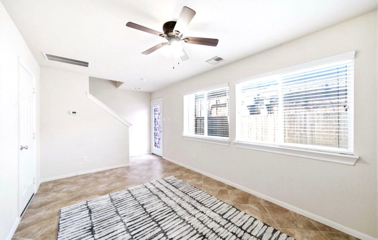 6363 Fairdale Lane, #L, Houston, TX 77057 1st floor flex room has access to the 2 car garage and to the full backyard. Added storage nook/space in the garage