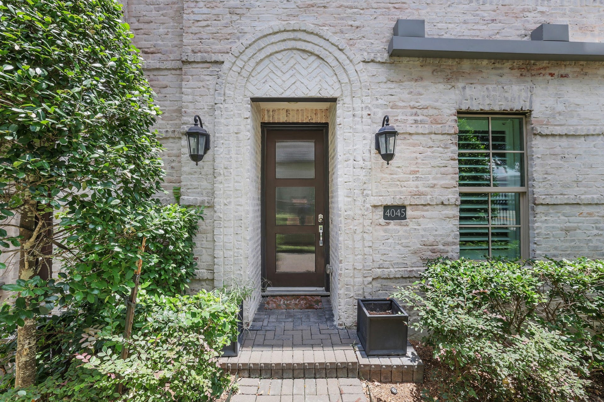 4045 Leeland Street, Houston, TX 77023 Gorgeous brick details adorn the entry to your new home!