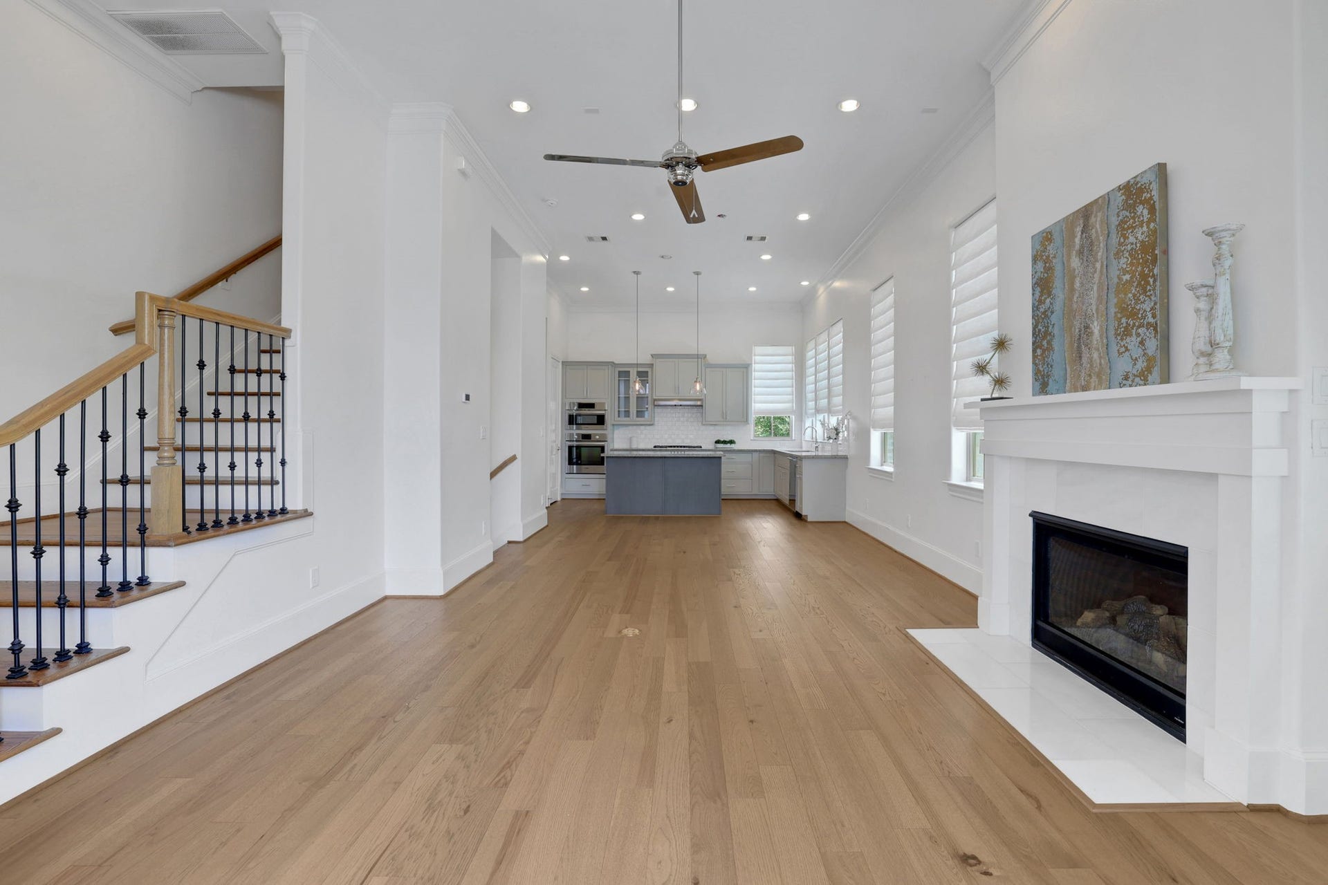 4045 Leeland Street, Houston, TX 77023 The charming fireplace anchors the living area