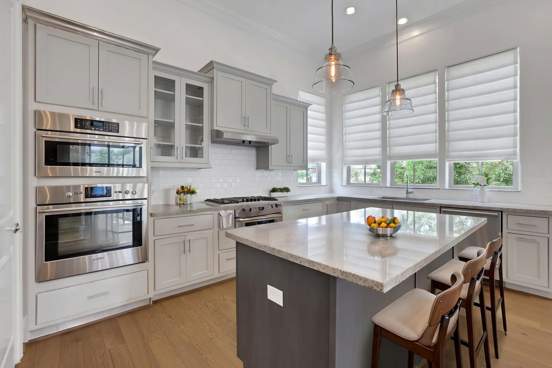 4045 Leeland Street, Houston, TX 77023 Bar seating and stainless appliances adorn this gorgeous kitchen