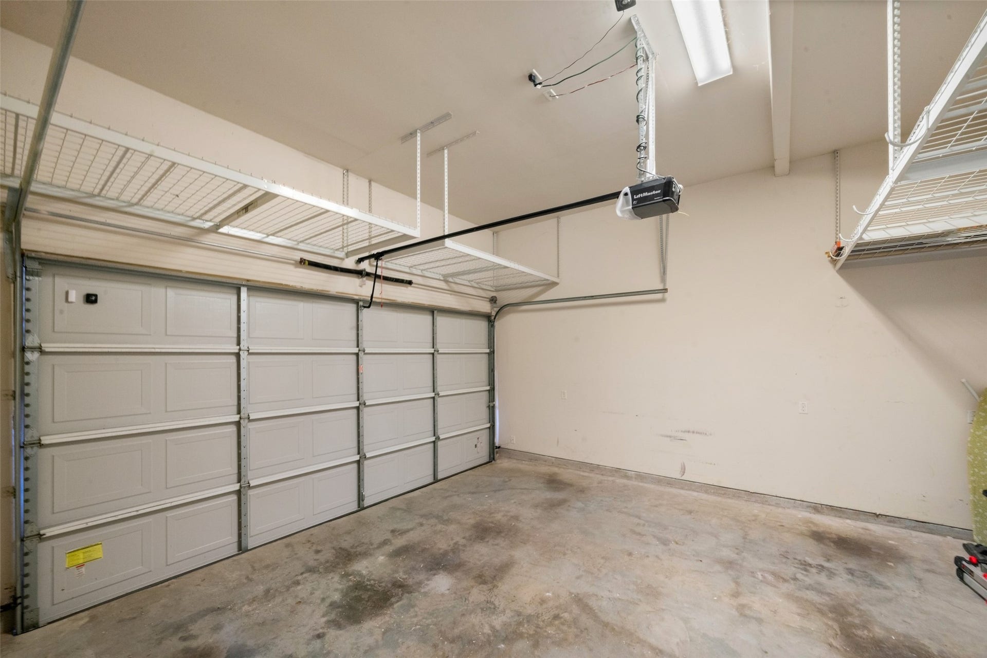 904 W 20th Street, #A, Houston, TX 77008 A view of your 2 car garage with loads of overhead storage.