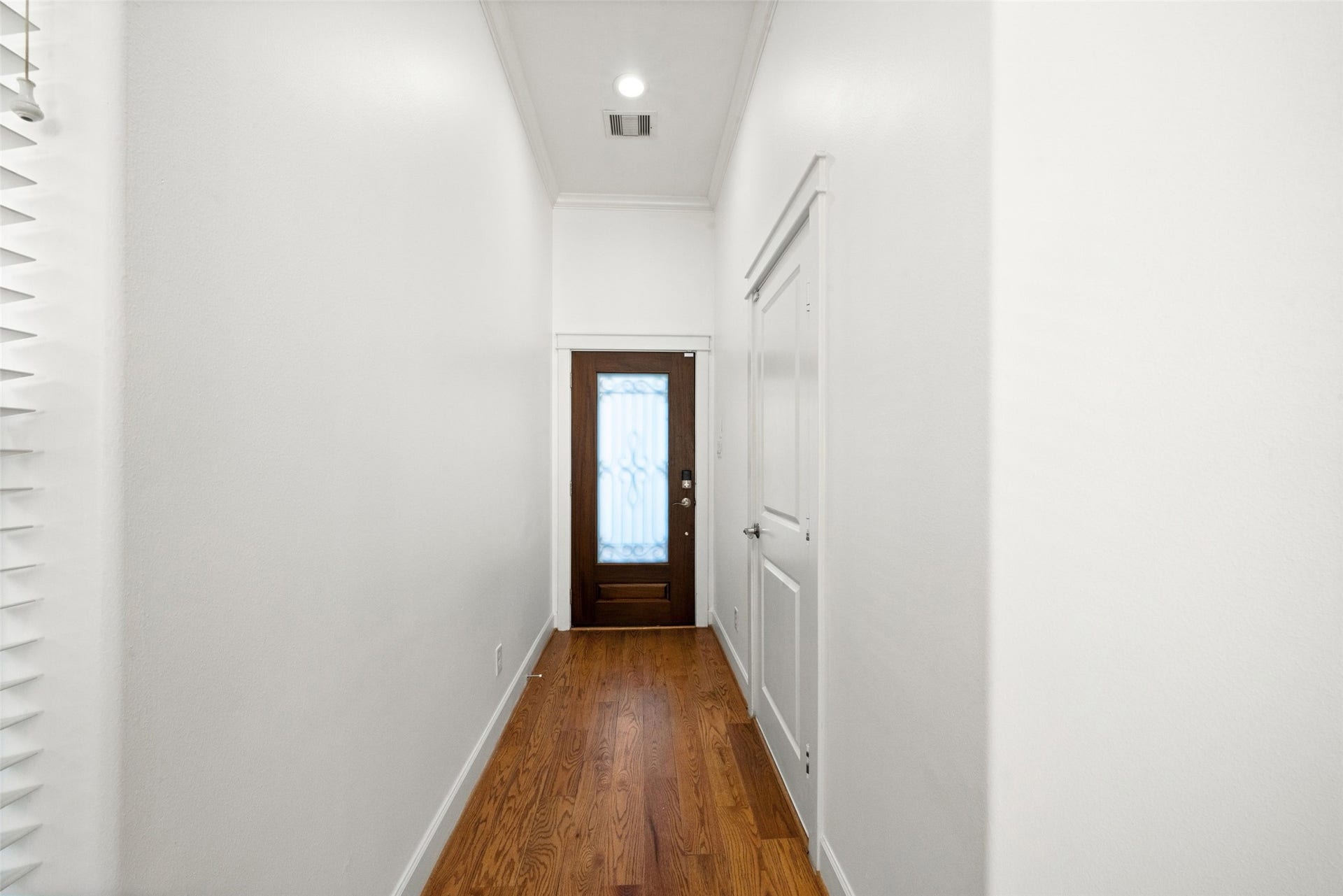 904 W 20th Street, #A, Houston, TX 77008 Upon entry, the door pictured to the right is your large 2-car garage equipped with overhead storage shelves.