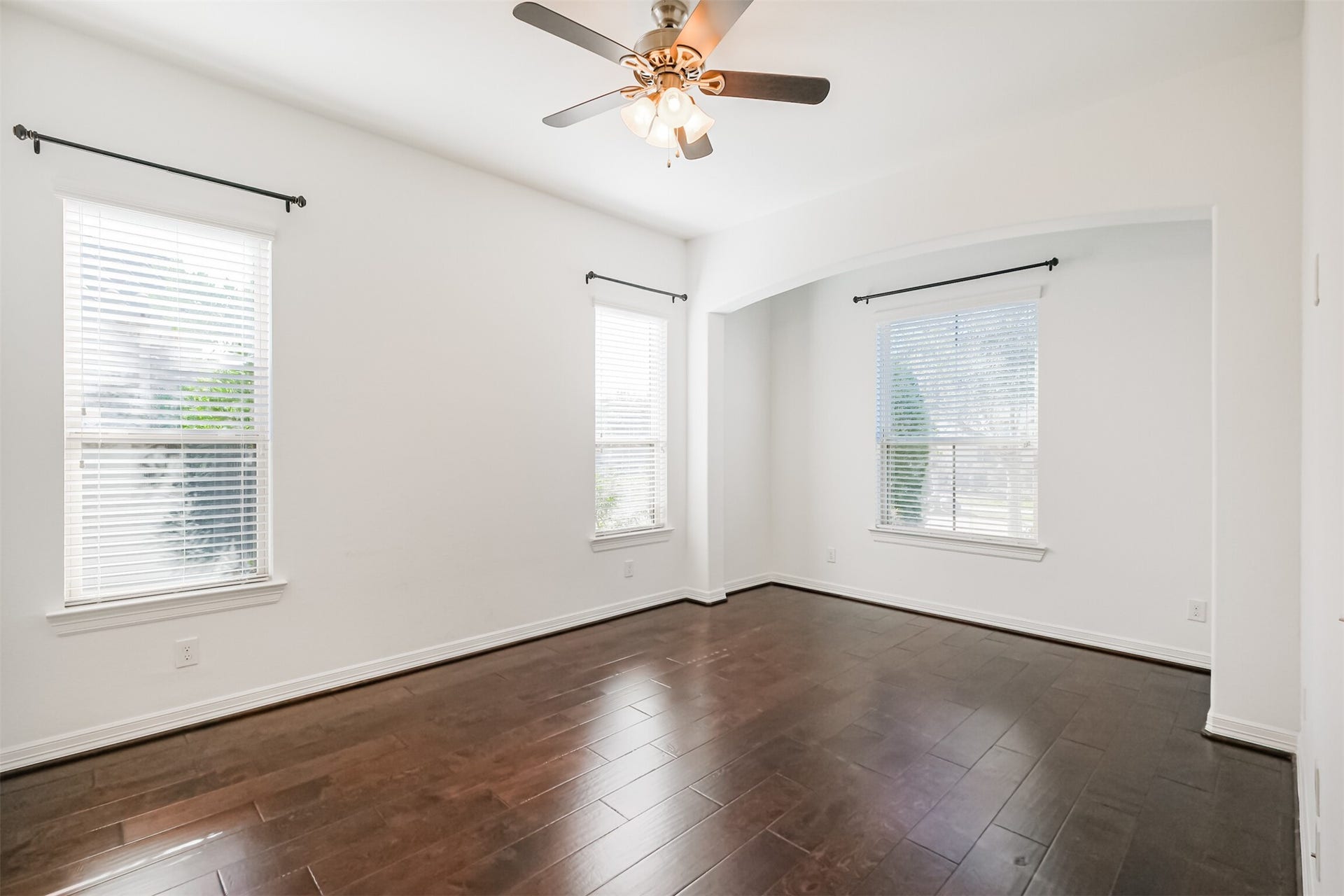 10 Silent Way Drive, Sugar Land, TX 77498 The room is full of natural light from the three large picture windows.