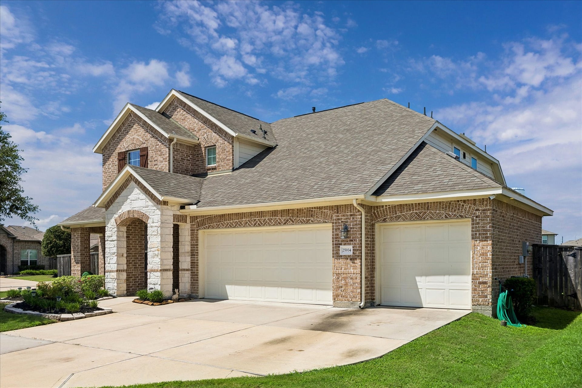 25934 Bronze Oak Court, Richmond, TX 77406 A 3-car attached garage with remote openers and a triple wide driveway gives you plenty of room for vehicles, storage and weekend projects. Upgraded LED lighting in the garage, preparation for a whole home generator and an owned alarm system add everyday convenience and extra peace of mind.