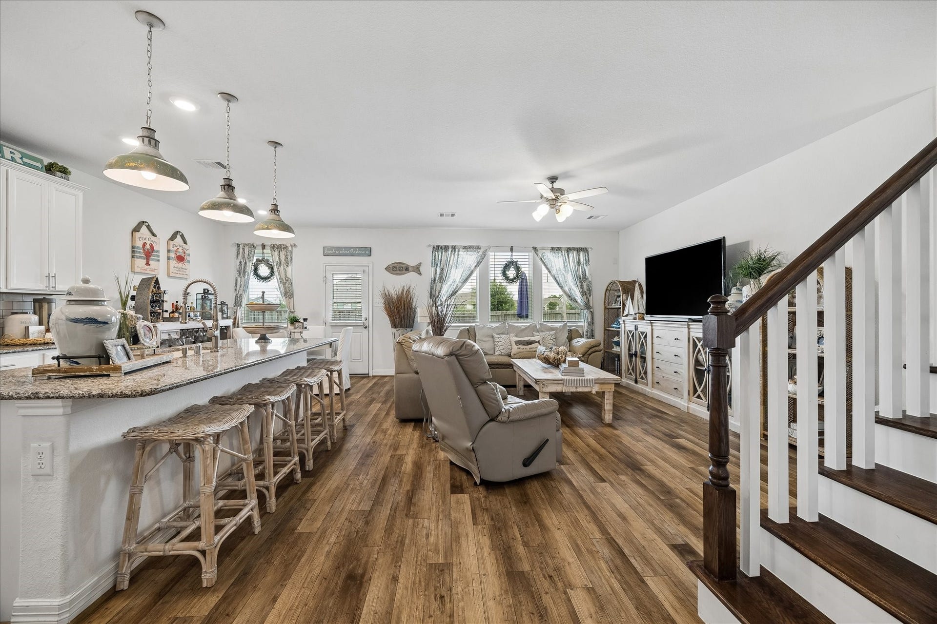 25934 Bronze Oak Court, Richmond, TX 77406 Designed for real life and effortless entertaining, this spacious family room flows seamlessly into the kitchen so everyone can stay connected, whether you are hosting a crowd, enjoying a quiet evening or simply sharing everyday moments.