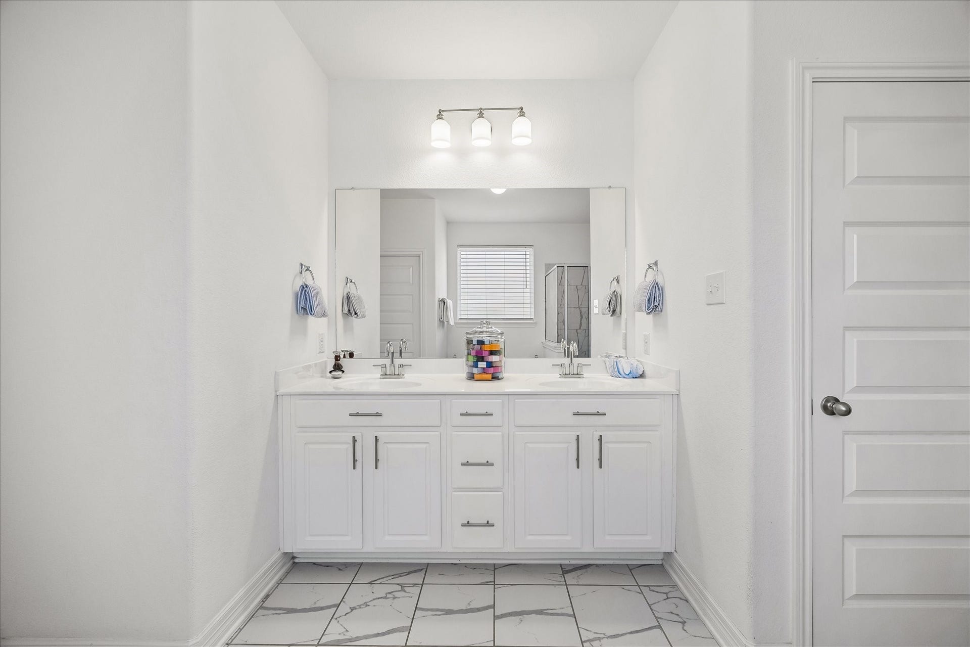 25934 Bronze Oak Court, Richmond, TX 77406 The dual sink vanity makes busy mornings and evening routines feel effortless, with generous counter space, plenty of storage and a clean, polished look.