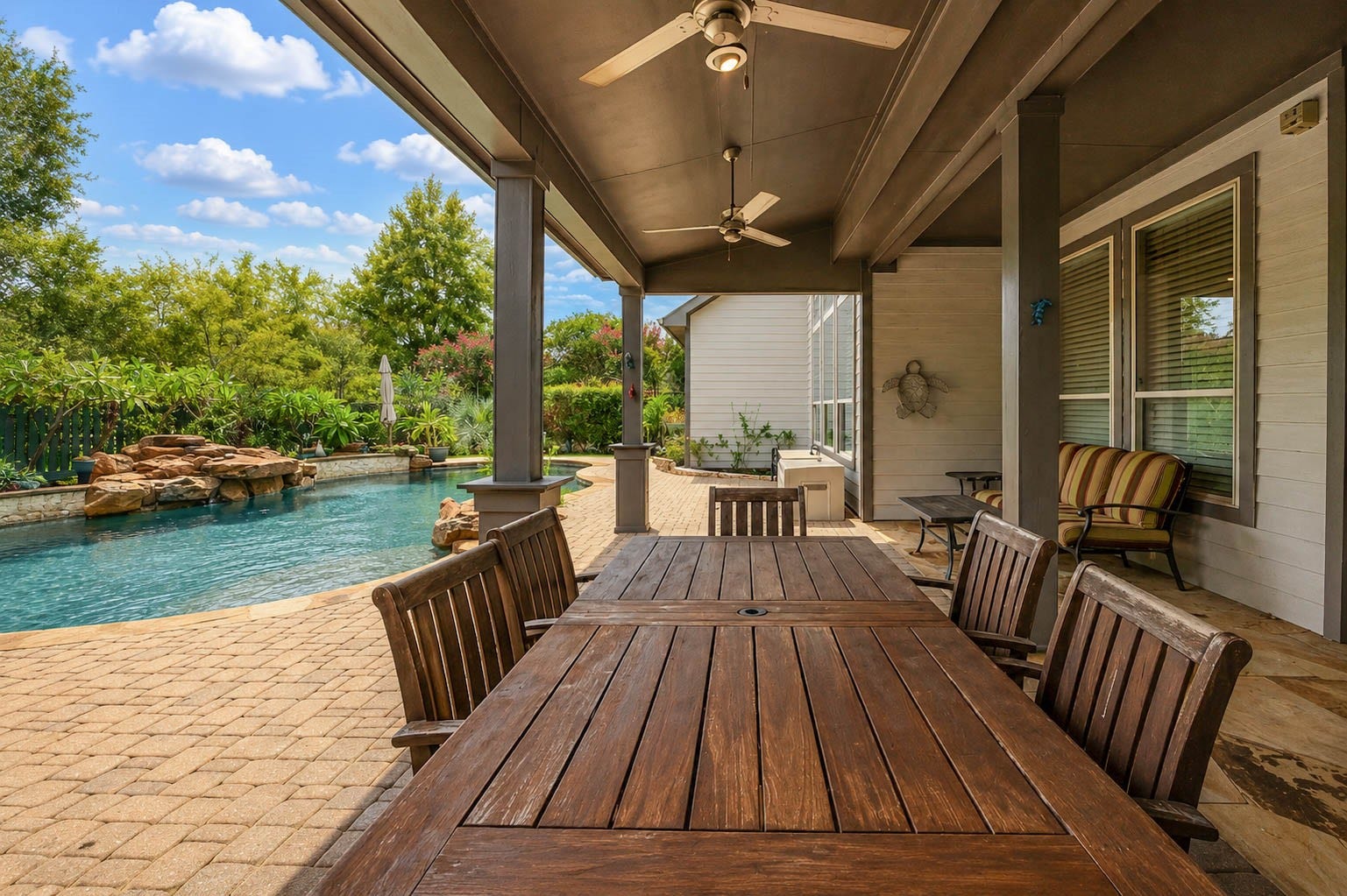 5331 W Farm Way, Fulshear, TX 77441 This approximately 550 square foot covered patio offers plenty of space for outdoor furniture or a grill, making the home ideal for entertaining.