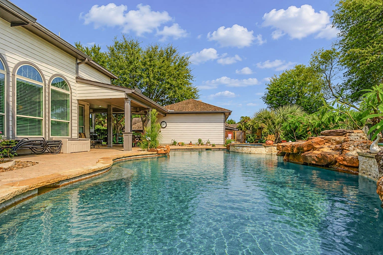 5331 W Farm Way, Fulshear, TX 77441 This stunning pool is designed for low maintenance, featuring an in-floor cleaning system, a modular media filter, and an automatic chlorinator, with new media filters installed in April 2026.
