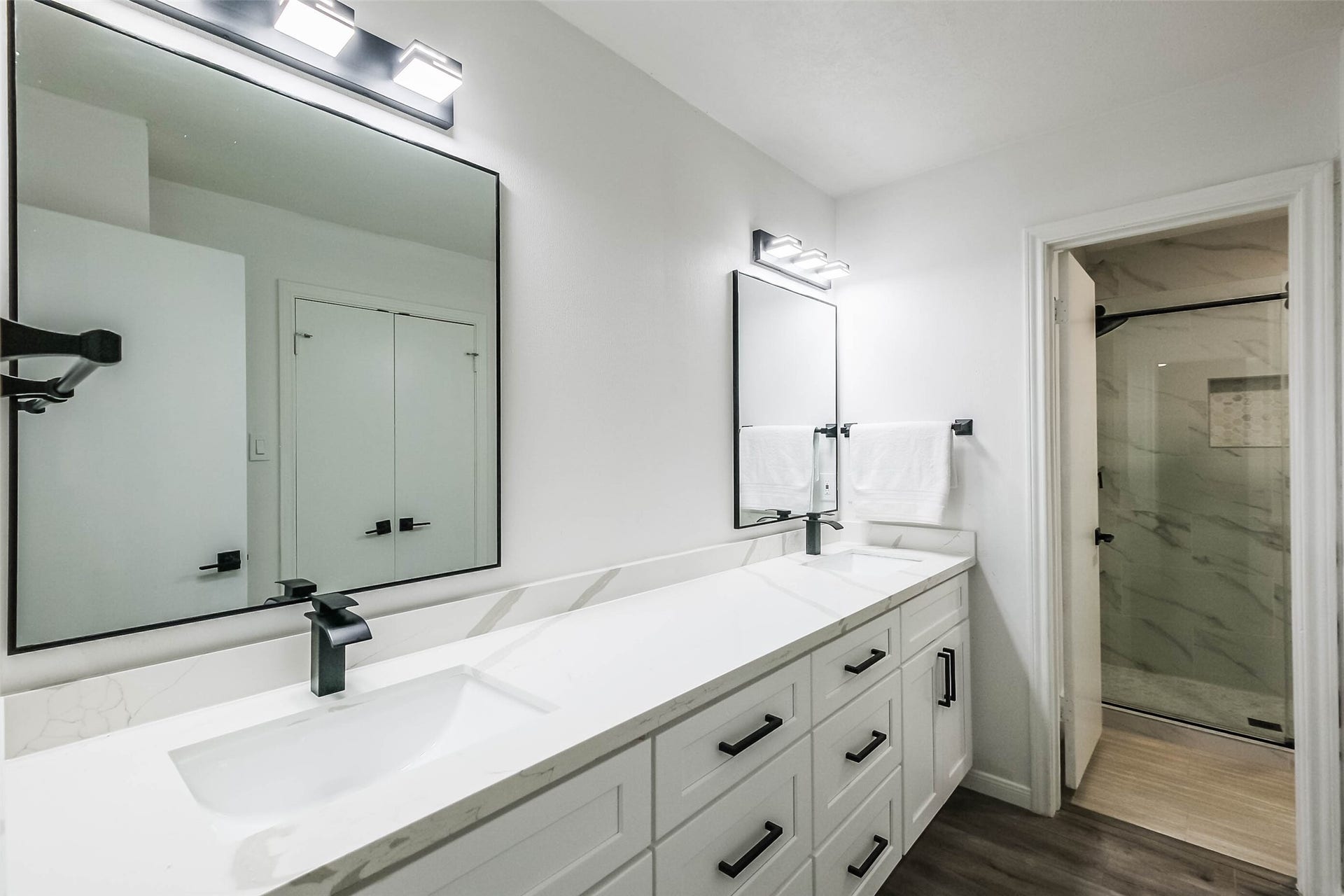 The primary bathroom has been totally renovated.