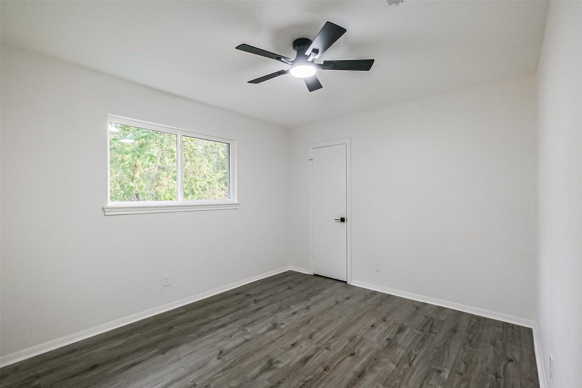 Bedroom 2 upstairs. All of the bedrooms have good, proportioned closets and natural light.