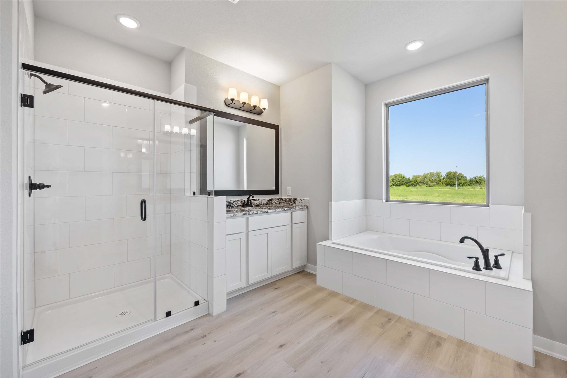 6702 Pelican Lane, Beasley, TX 77417 The luxurious owner's retreat is a private oasis with a spa-inspired bath and an extended walk-in closet.