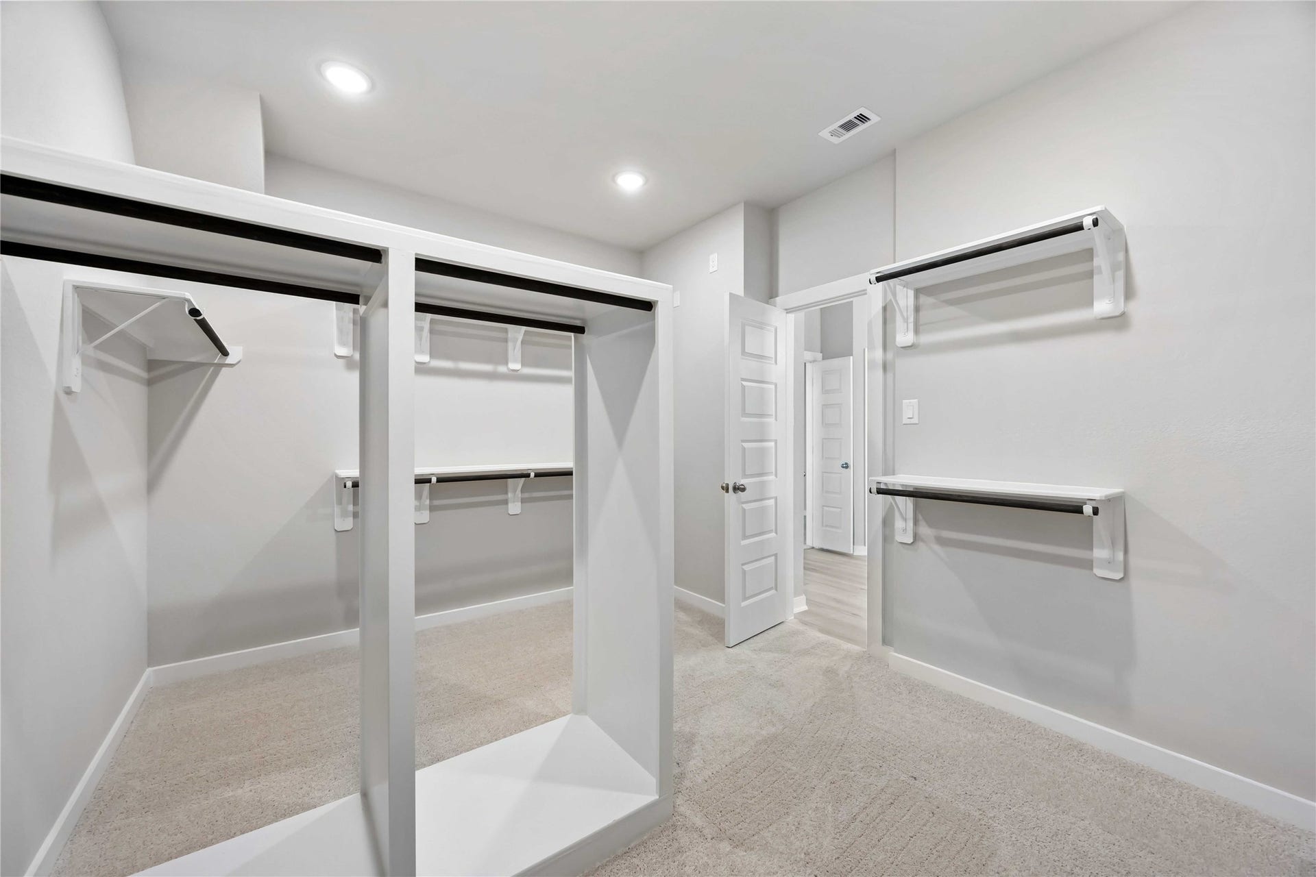 6702 Pelican Lane, Beasley, TX 77417 The luxurious owner's retreat is a private oasis with a spa-inspired bath and an extended walk-in closet.
