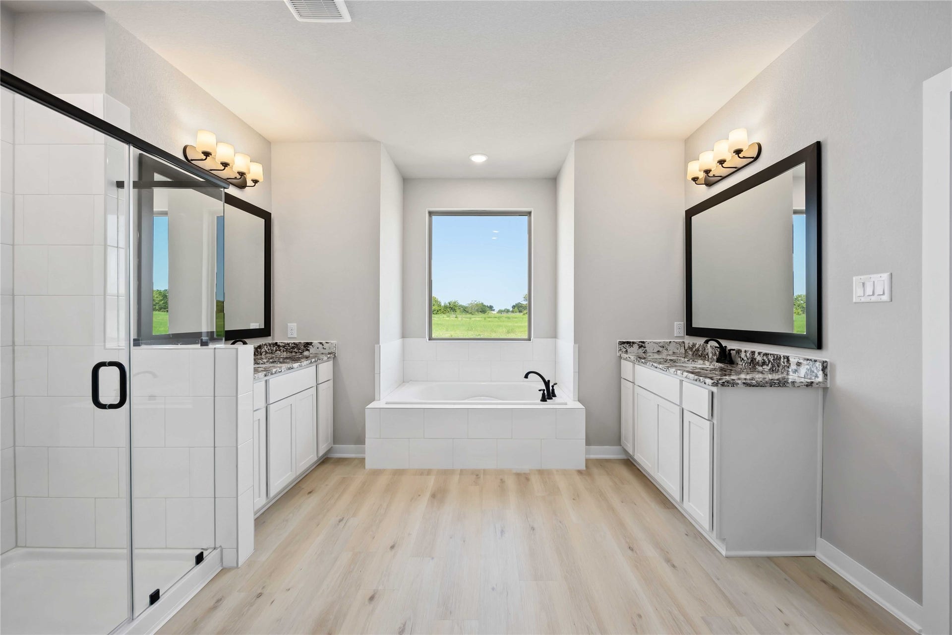 6702 Pelican Lane, Beasley, TX 77417 The luxurious owner's retreat is a private oasis with a spa-inspired bath and an extended walk-in closet.