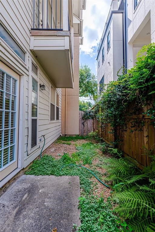 5202 Crawford Street, #17, Houston, TX 77004 Double doors lead to a small yard outside third bedroom
