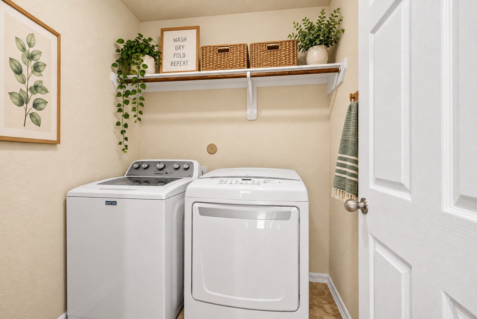9979 Chimney Swift Lane, Conroe, TX 77385 Virtually staged upstairs laundry room.