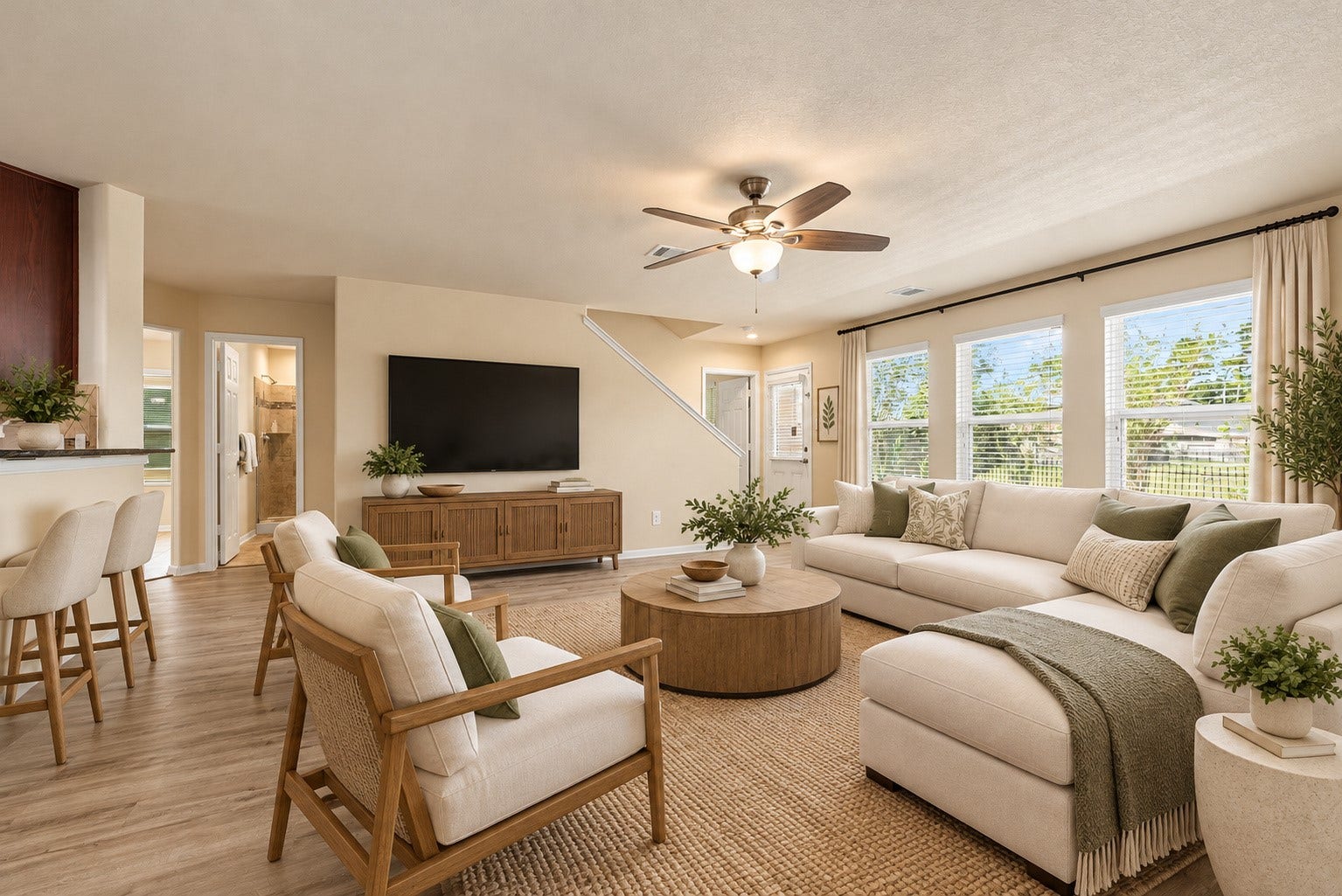 9979 Chimney Swift Lane, Conroe, TX 77385 Virtually Staged family room with view to backyard.