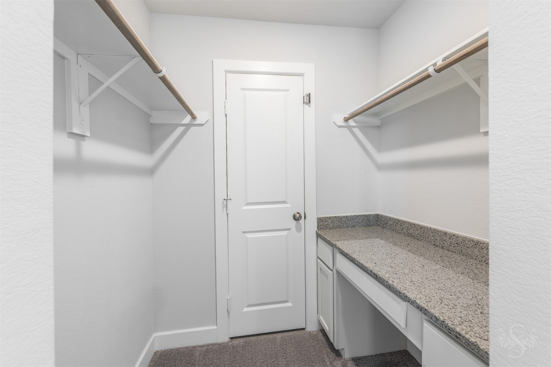 20922 Maudine Drive, Cypress, TX 77433 A tucked-away planning center features a built-in desk with a granite counter, drawers and cabinetry. This convenient space is ideal for homework, managing household paperwork or keeping school supplies organized.