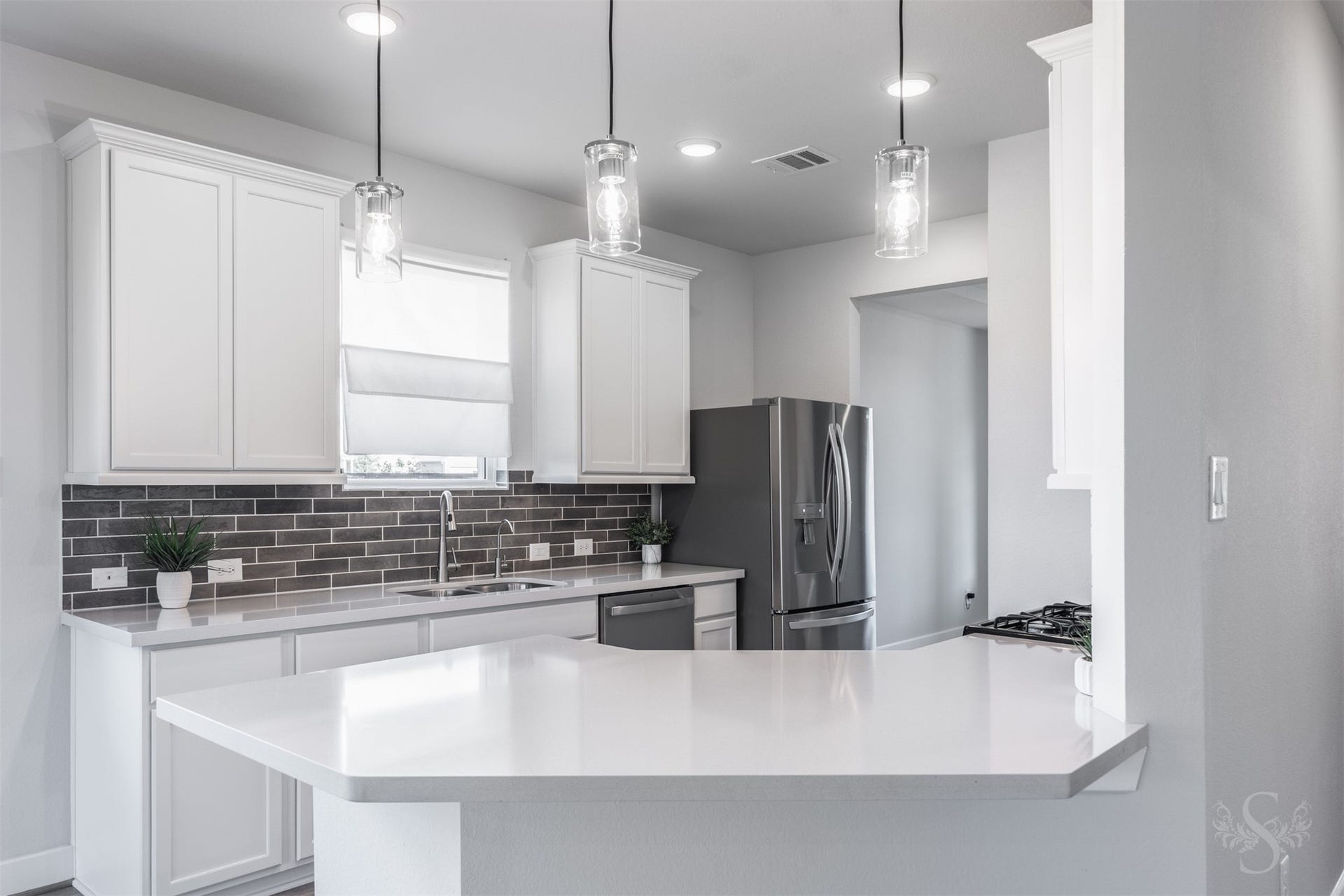 20922 Maudine Drive, Cypress, TX 77433 A tray ceiling and gorgeous flooring add stylish detail to the formal dining room. A large window brightens this inviting space, ready for family dinners and entertaining friends.