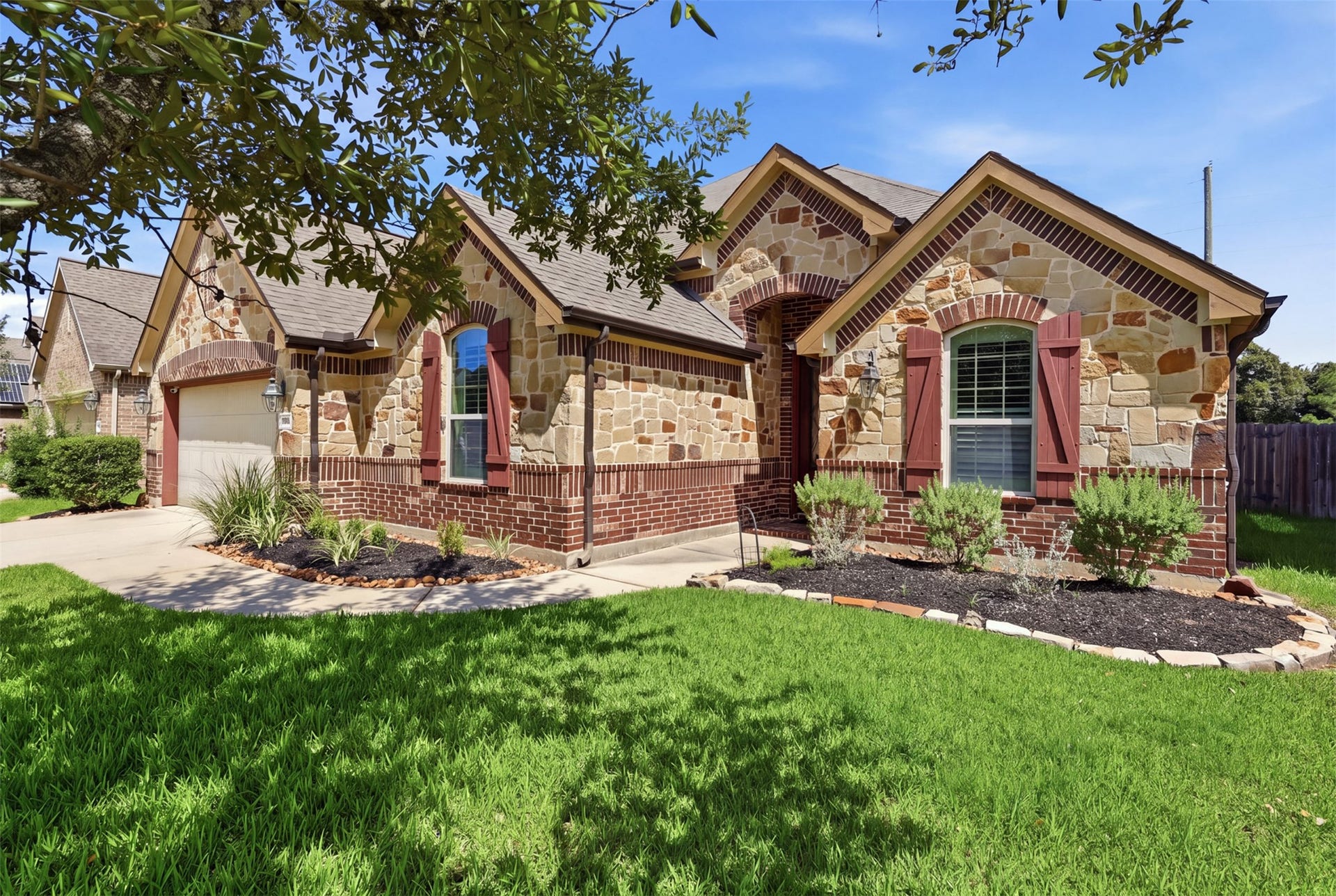 Beautiful curb appeal welcomes you to this charming Auburn Lakes home.