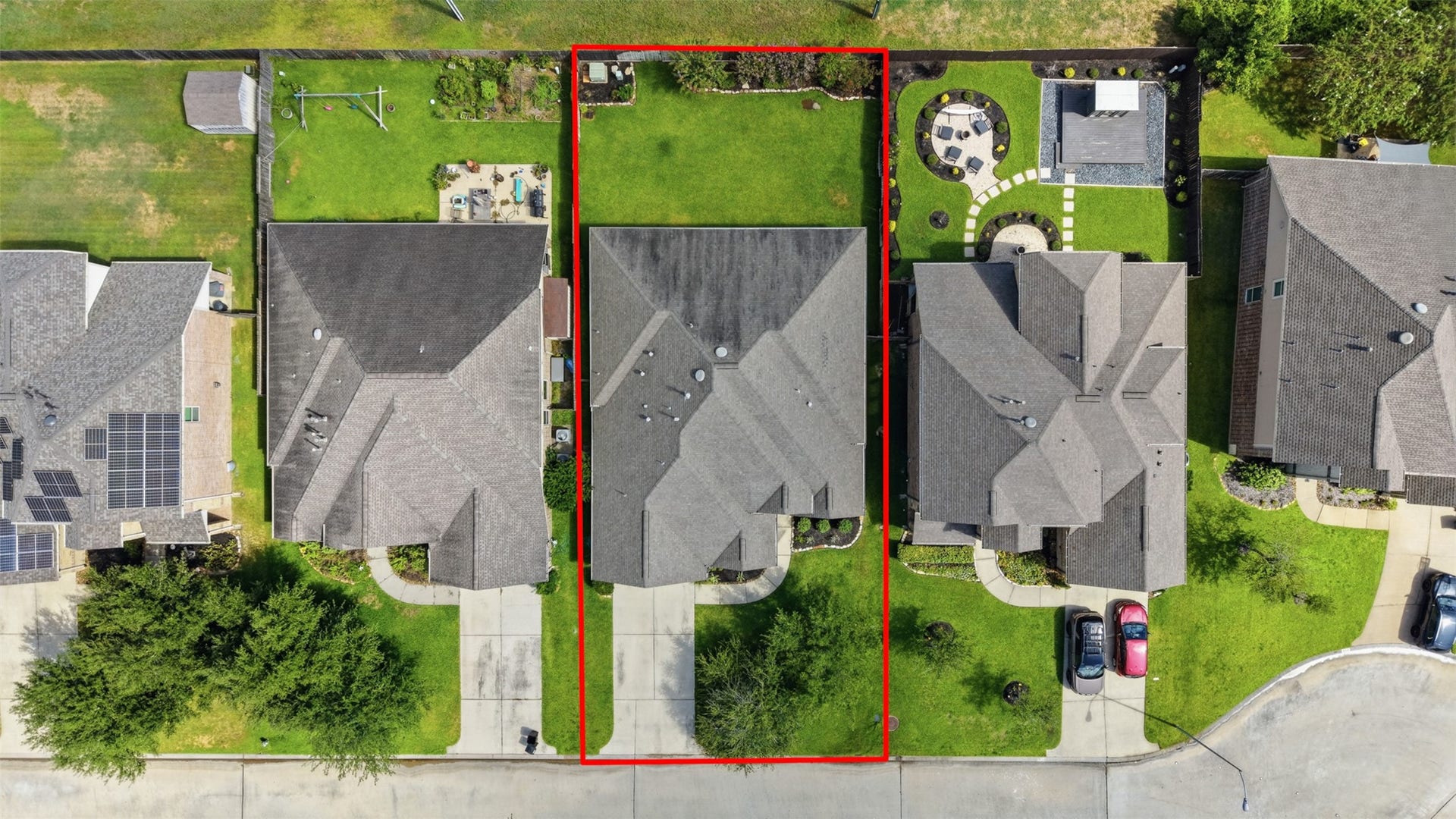 Aerial view highlights the expansive fenced backyard, covered patio, and added privacy with no rear neighbors.