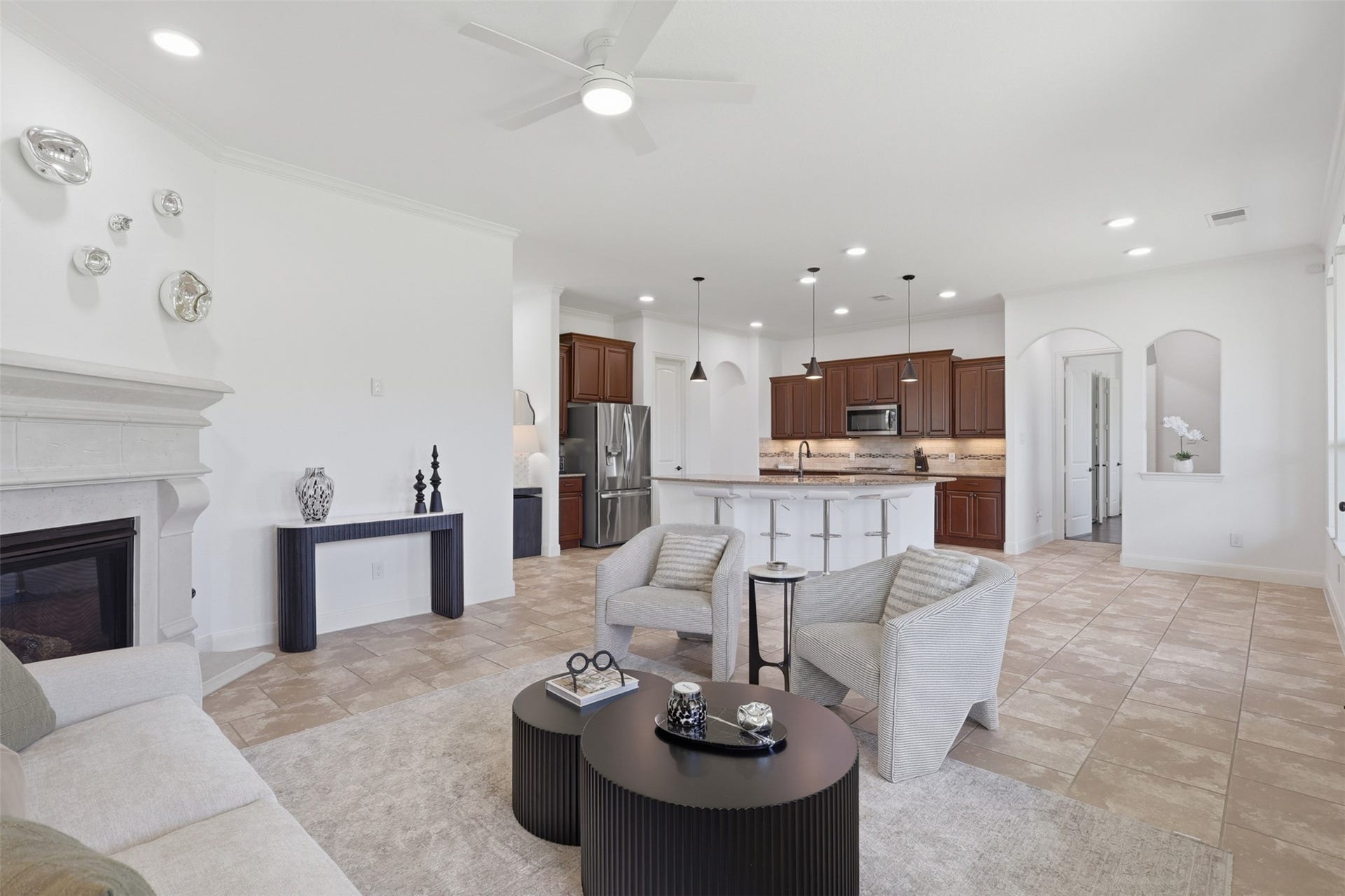 Seamless flow between the family room, kitchen, and breakfast area.