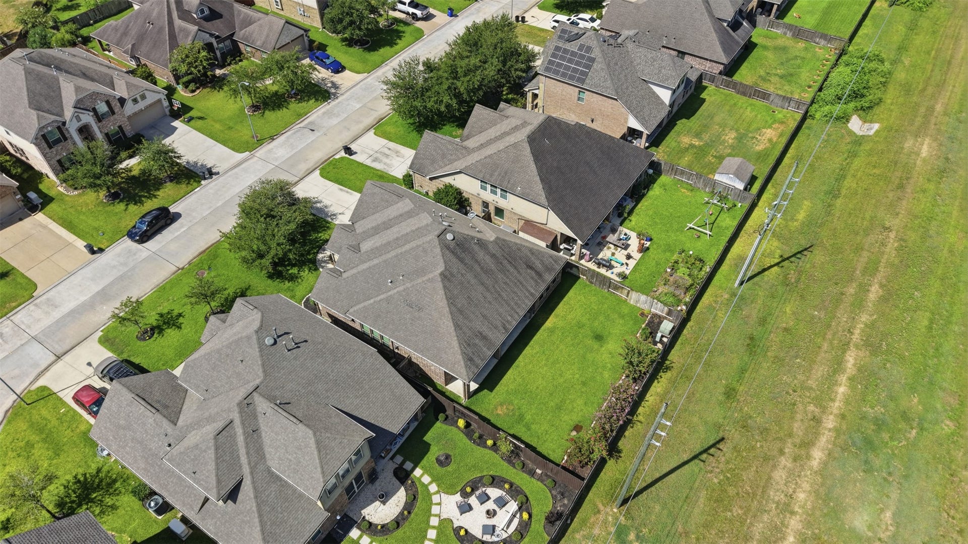 Aerial perspective showcasing the homes private setting with no rear neighbors.