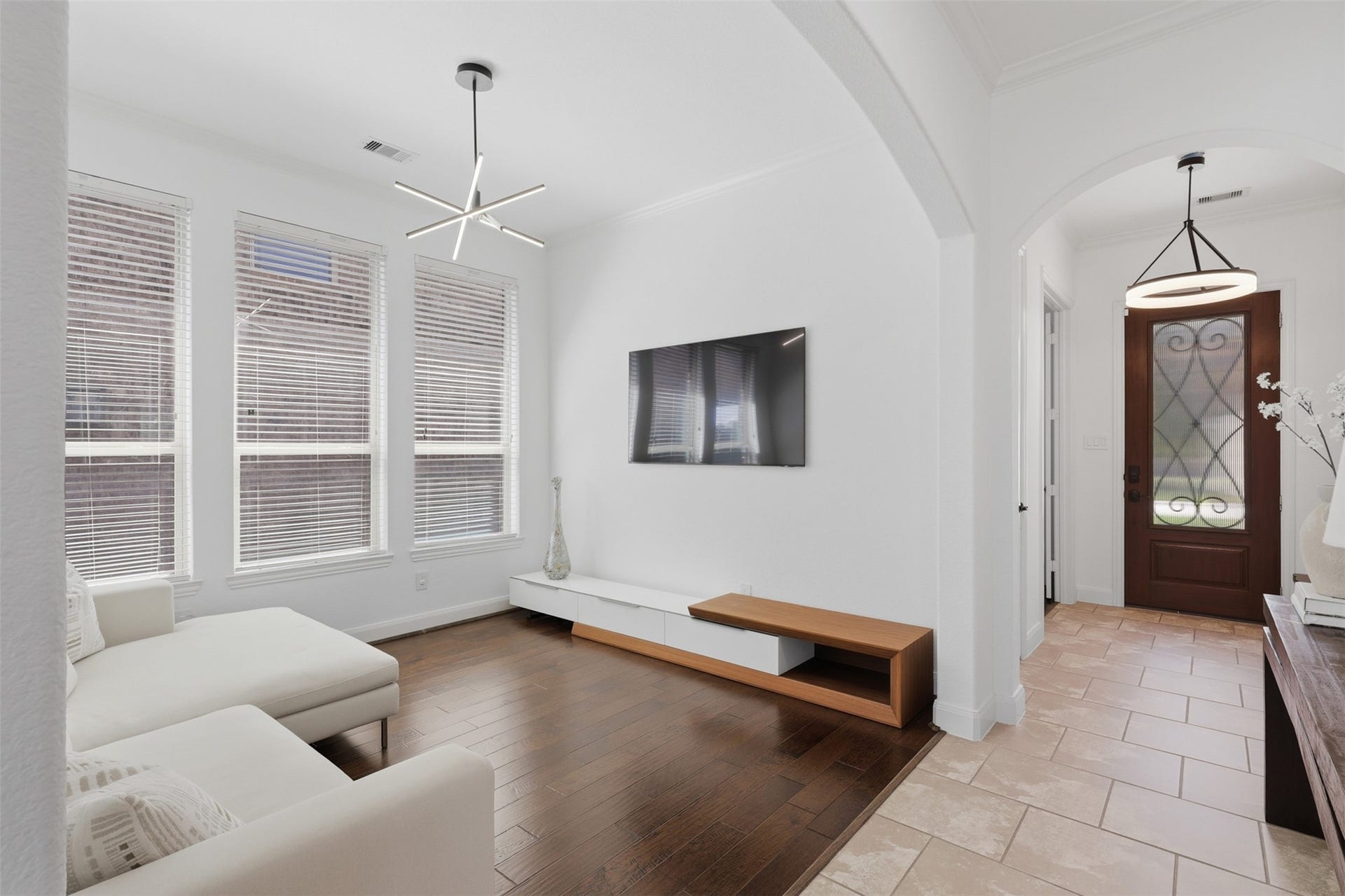 Formal dining room currently styled as a comfortable den.