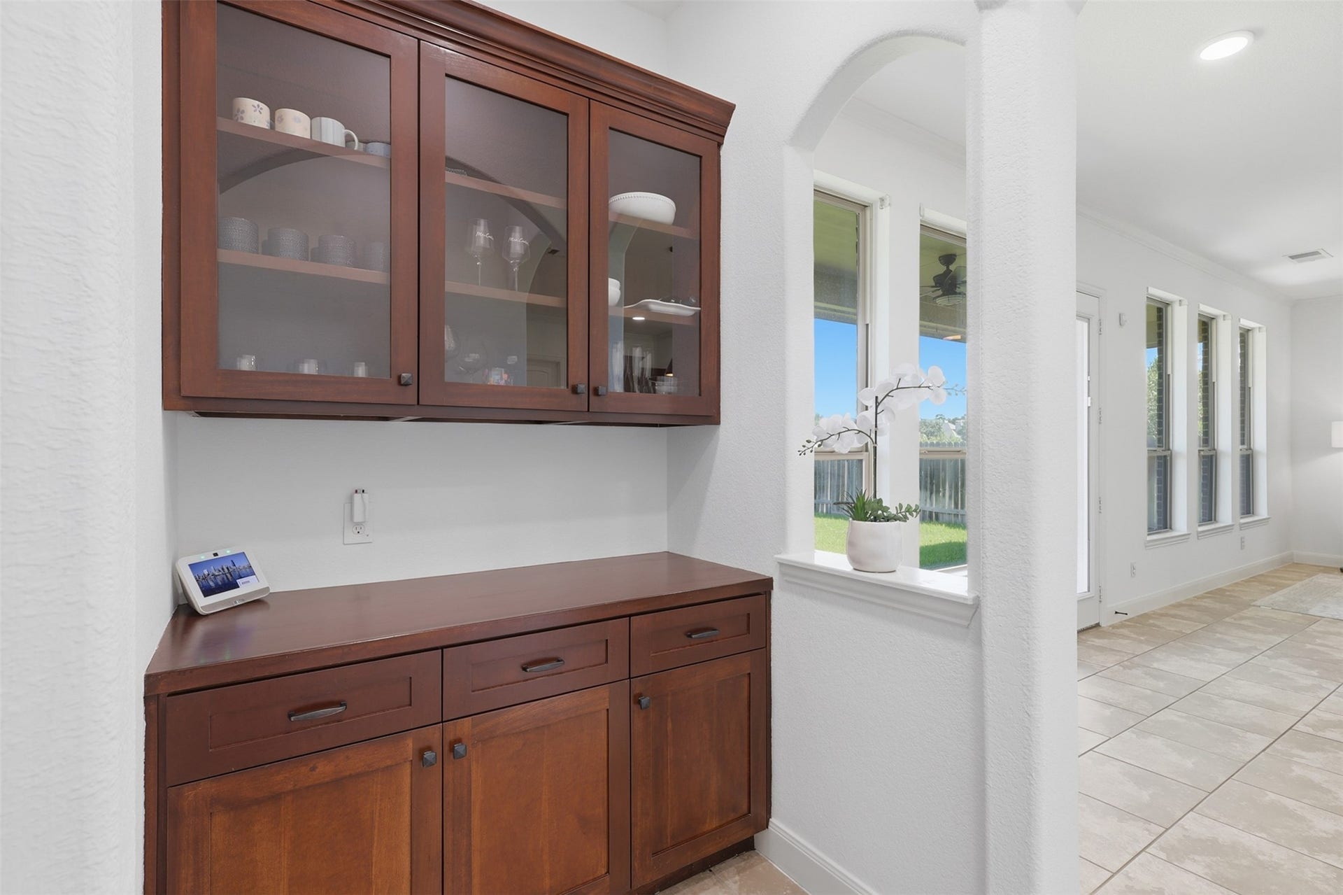 Convenient butlers pantry offers additional cabinetry and serving space.