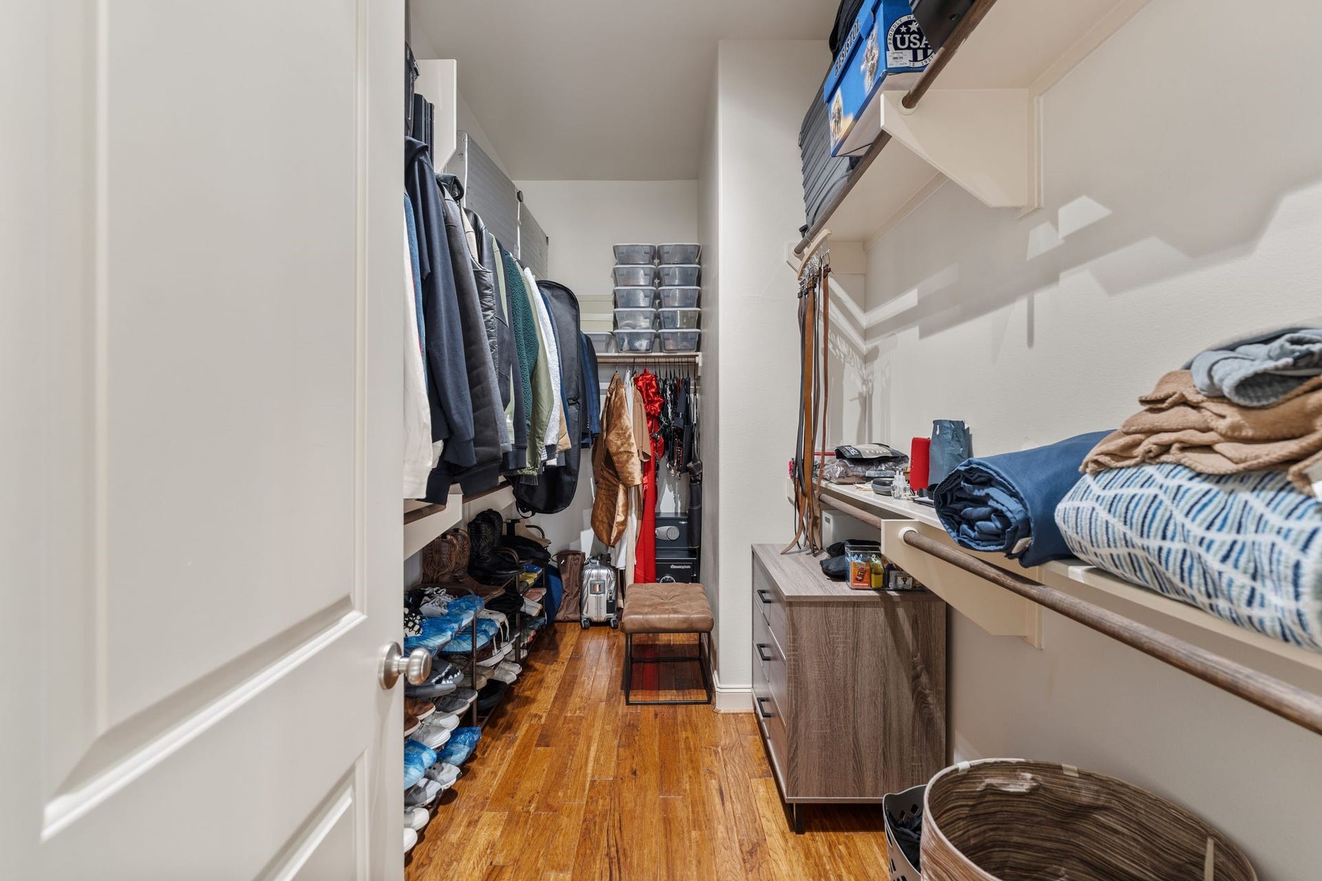 1337 W 24th Street, Houston, TX 77008 The second primary bedroom closet showcases additional hanging space and shelving for clothing, shoes and everyday essentials.