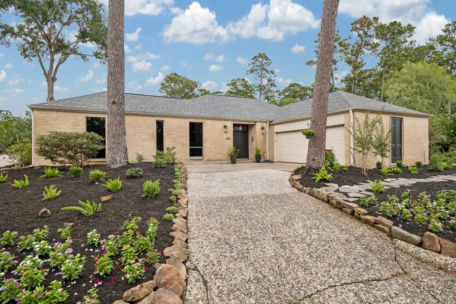 Property photo for 3203 Deep River Court, Kingwood, TX