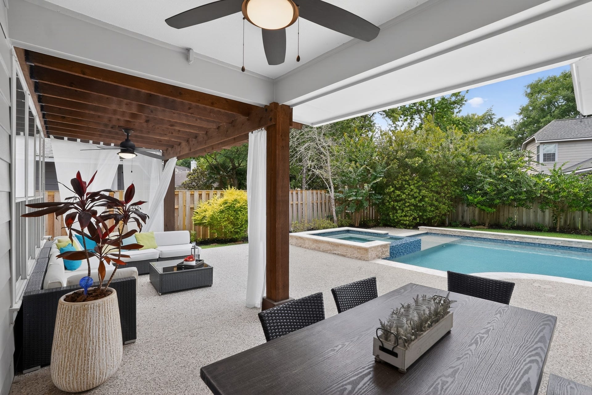 42 Crisp Morning Circle, The Woodlands, TX 77382 Large covered patio overlooking this gorgeous backyard