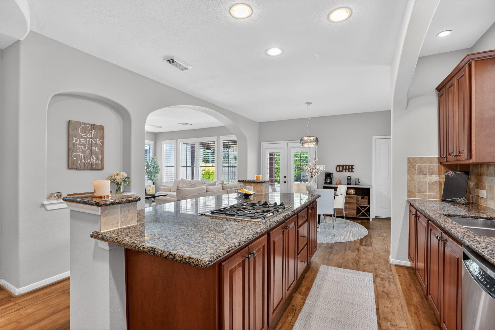 42 Crisp Morning Circle, The Woodlands, TX 77382 kitchen open to living room