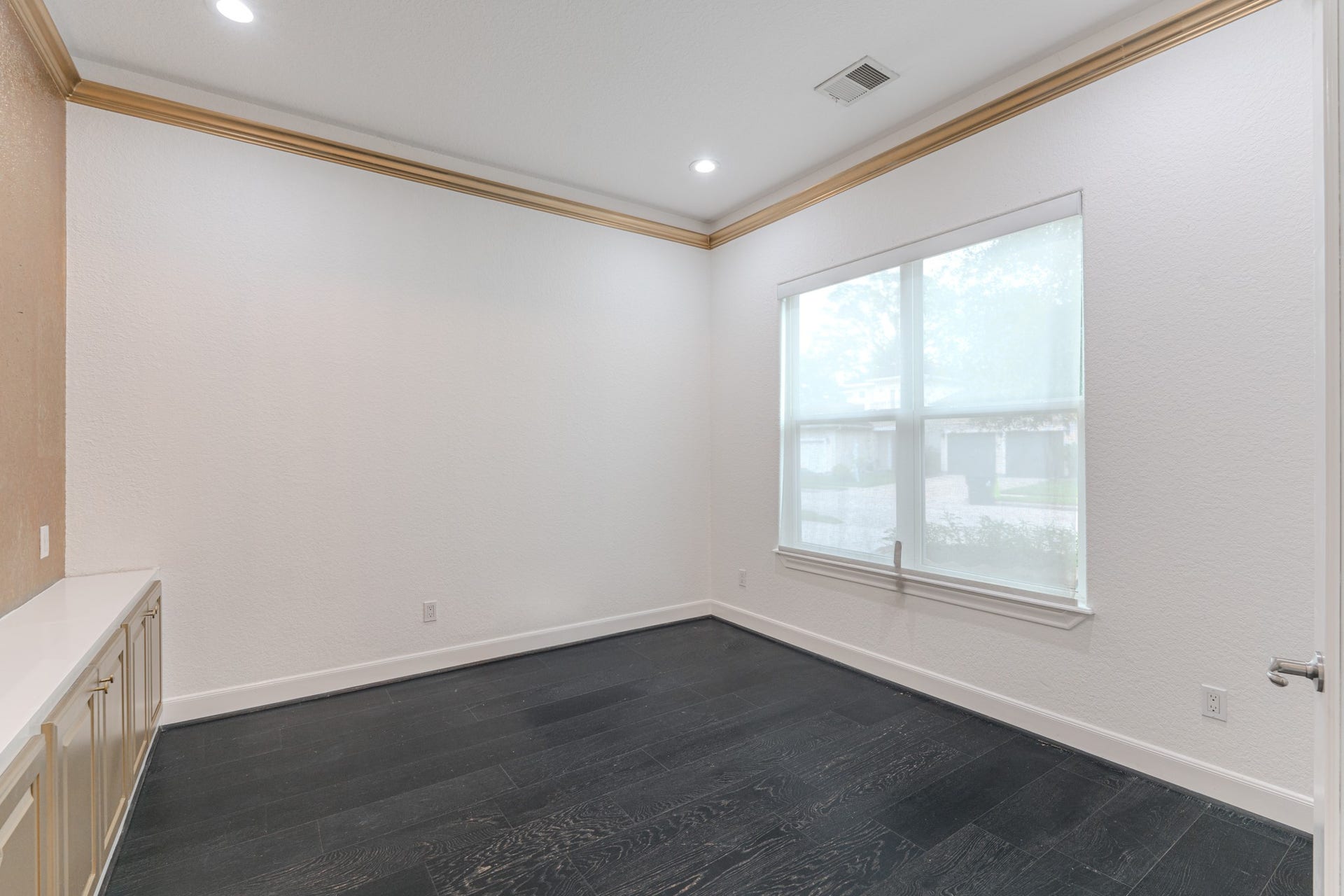 58 Flamingo Landing Drive, Missouri City, TX 77459 Study or home office, engineered wood, counter space with built-in cabinetry, electic shades, crown molding, french doors.