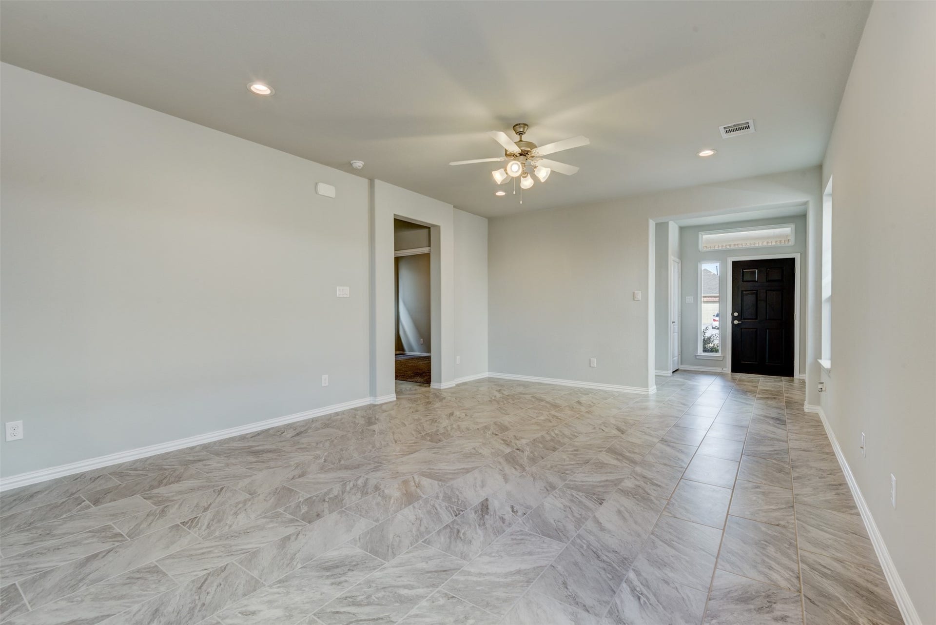 2202 Windy Grove Drive, Texas City, TX 77568 Noticing the tile floors and the high ceilings