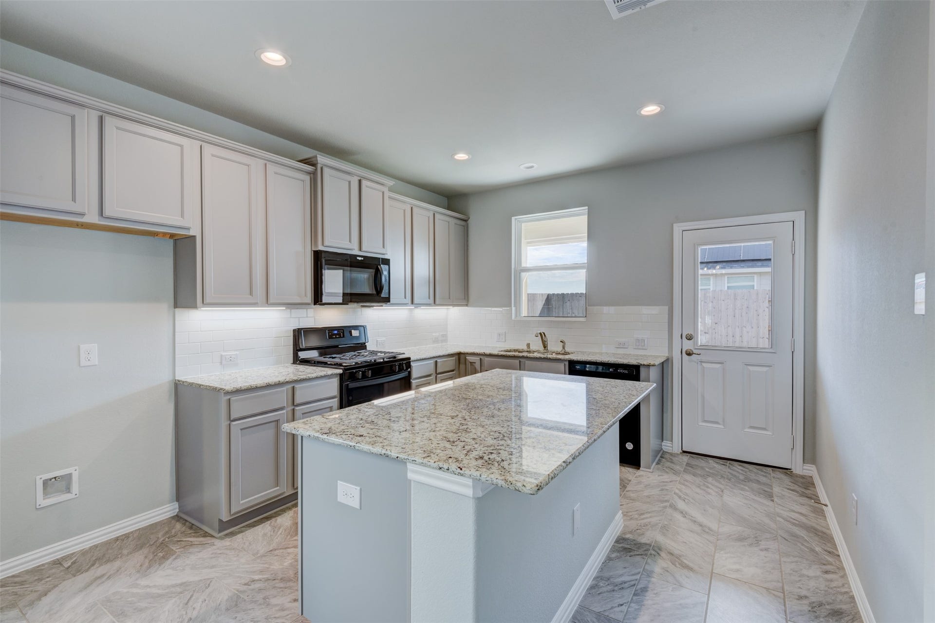 2202 Windy Grove Drive, Texas City, TX 77568 Kitchen offers island bar seating