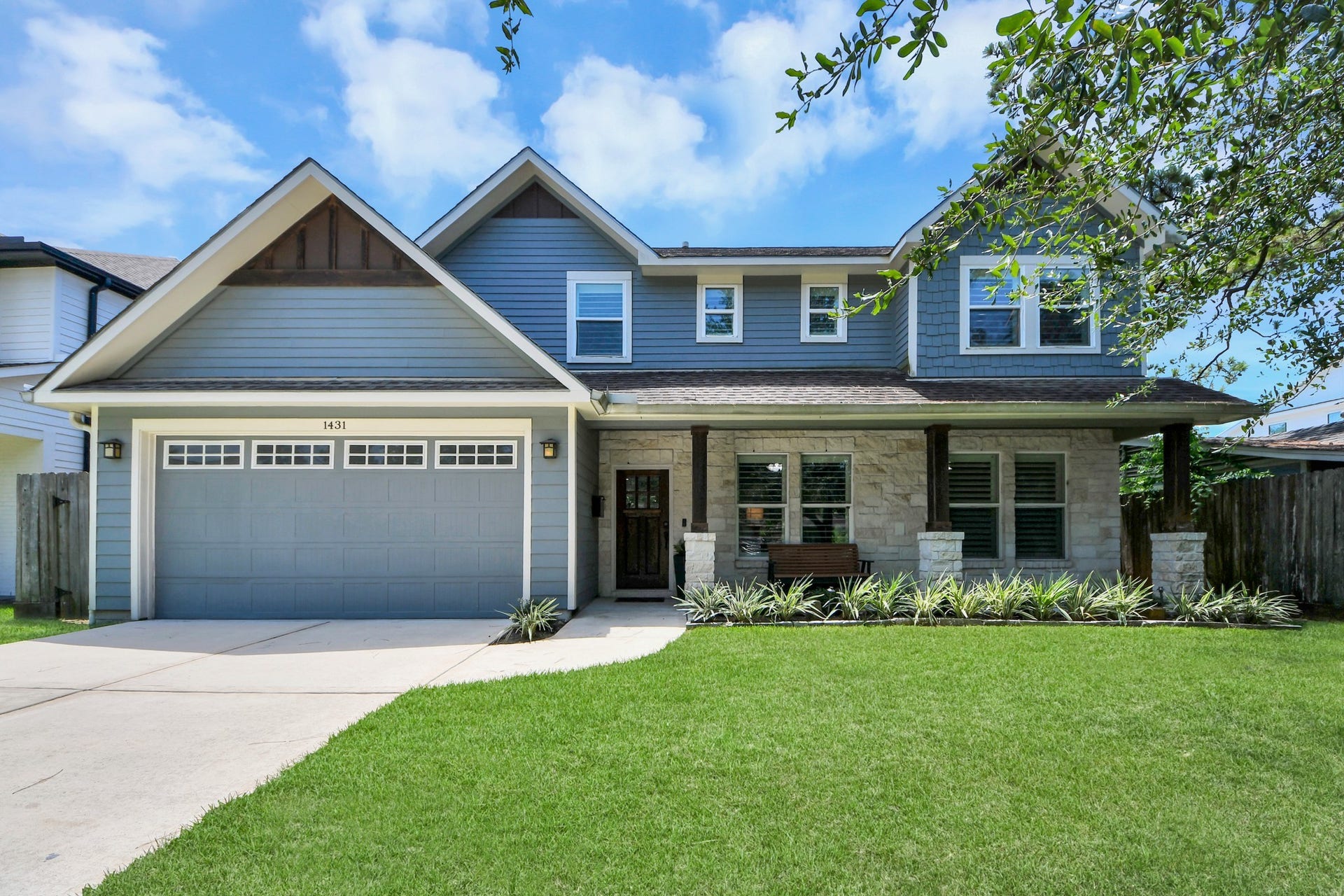 1431 Martin Street, Houston, TX 77018 Discover this charming two-story modern craftsman home with a spacious two-car garage, an inviting front porch, and a beautifully landscaped yard.