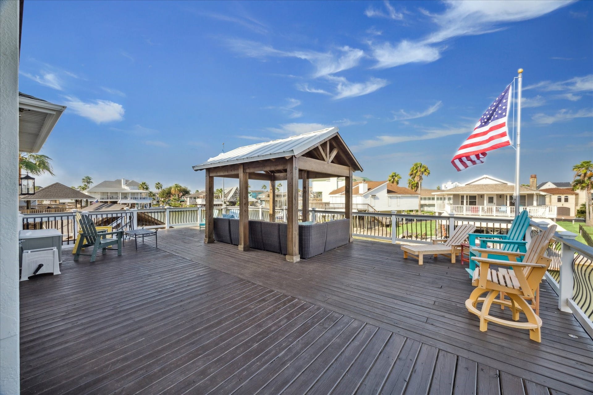 241 Tamana Drive, Tiki Island, TX 77554 pergola off the family room level that provides the comfort of shade and lots of breezy air!