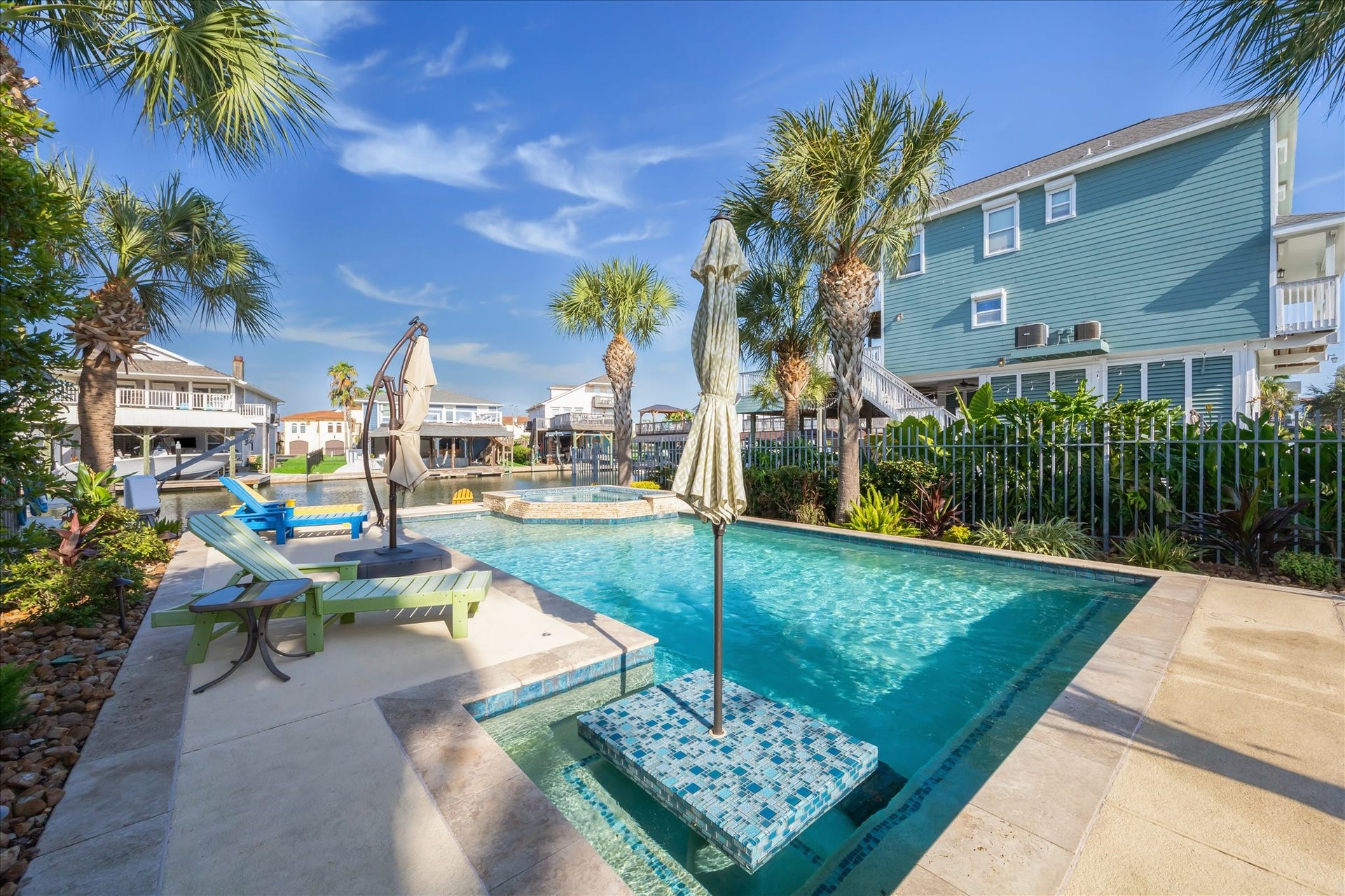 241 Tamana Drive, Tiki Island, TX 77554 pool has a heater for your hot tub fun and a chiller for your hot summer fun.