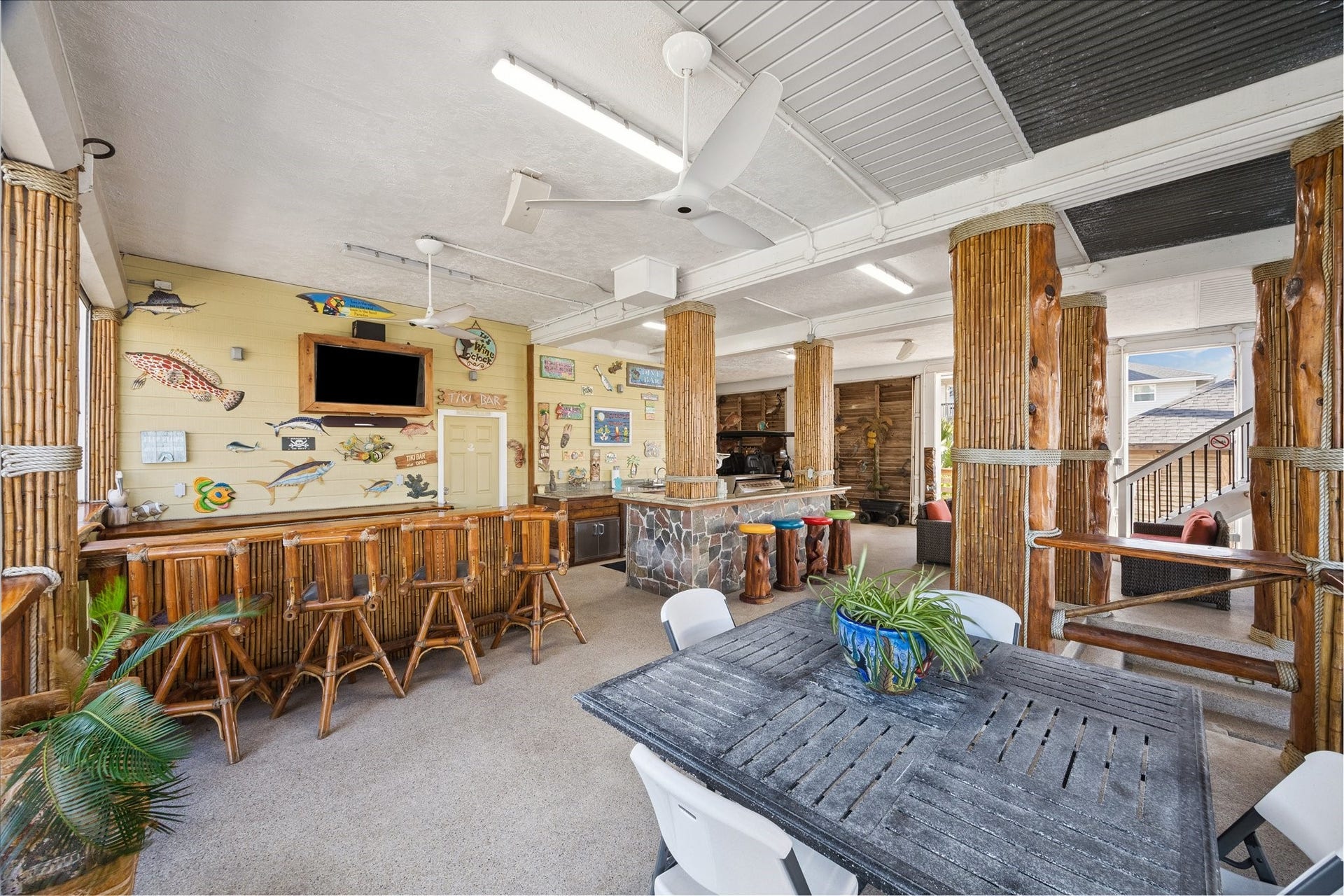 241 Tamana Drive, Tiki Island, TX 77554 coastal bamboo vibe for the pool fun