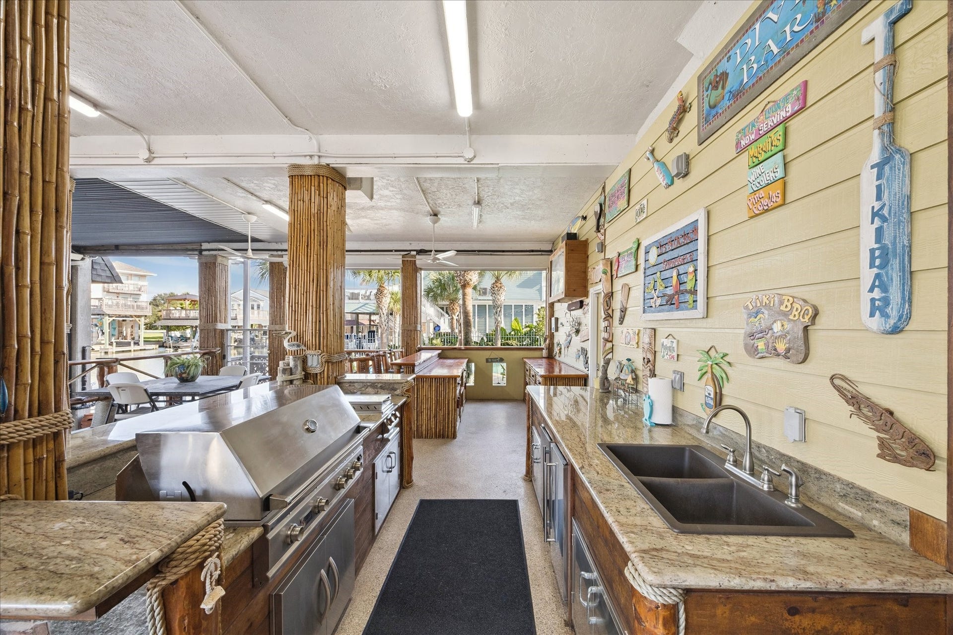 241 Tamana Drive, Tiki Island, TX 77554 two oversized entertainment bars with cooking capabilities