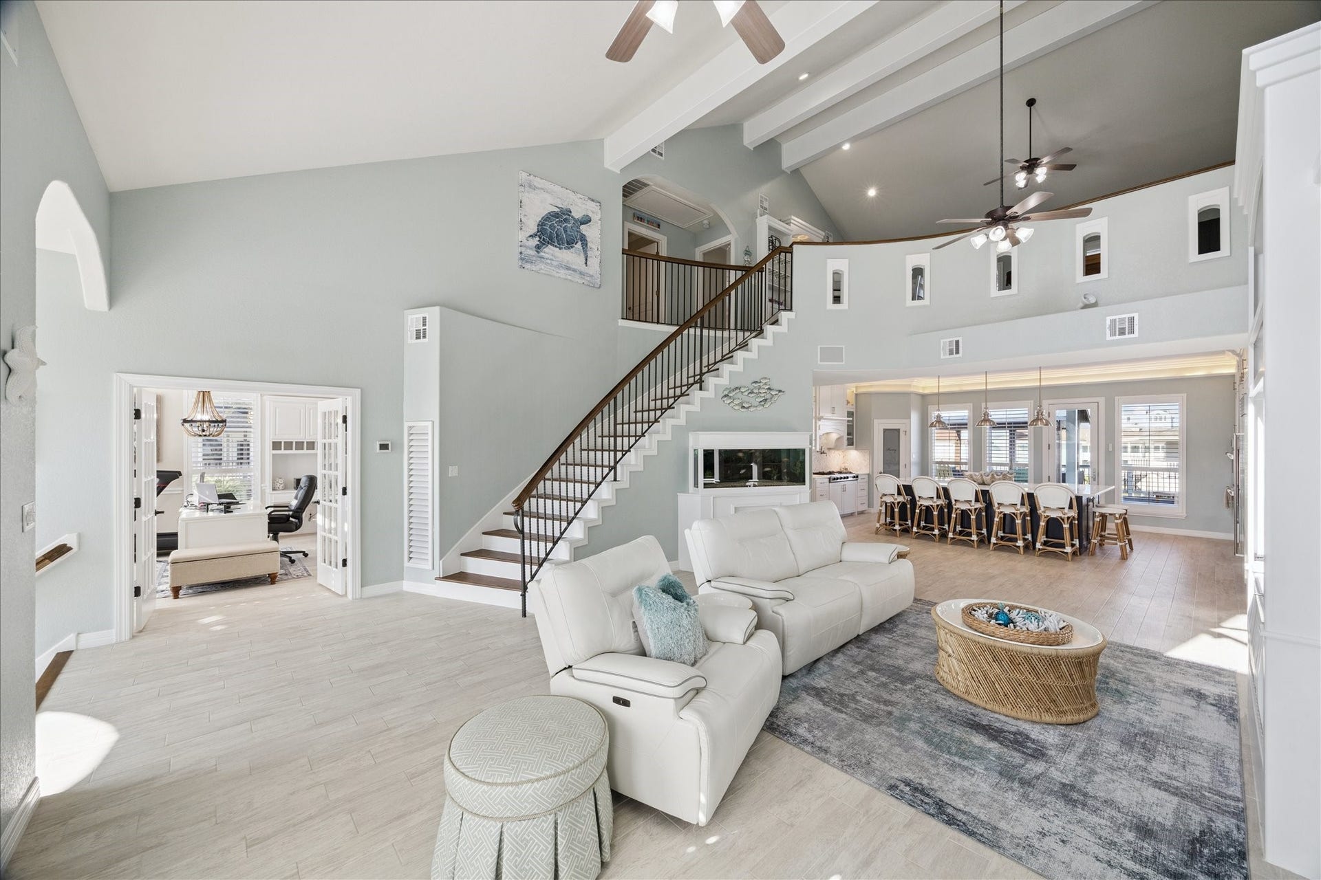 241 Tamana Drive, Tiki Island, TX 77554 sweeping staircase to greet you