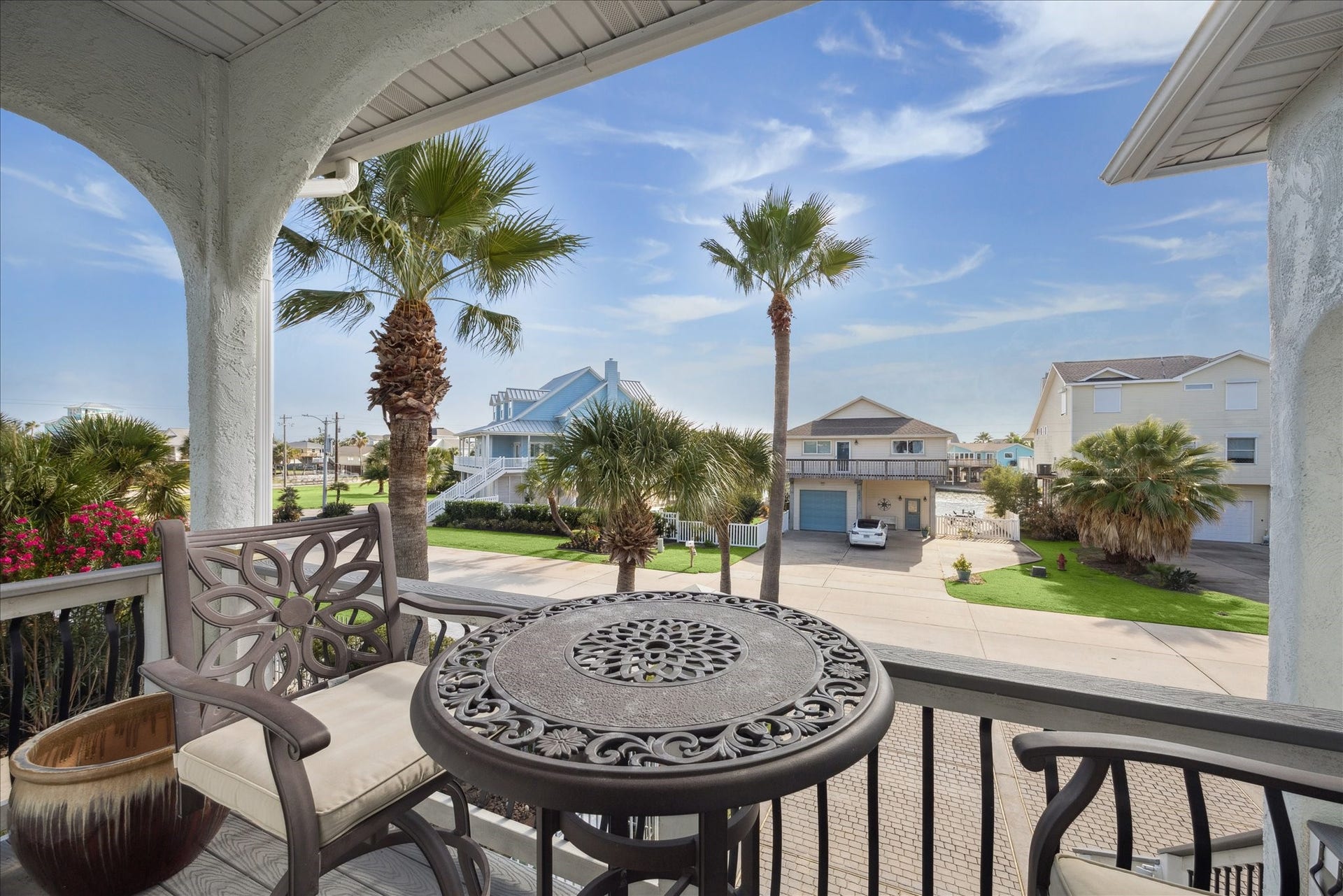 241 Tamana Drive, Tiki Island, TX 77554 street level covered sitting area to watch the sun rise mornings!