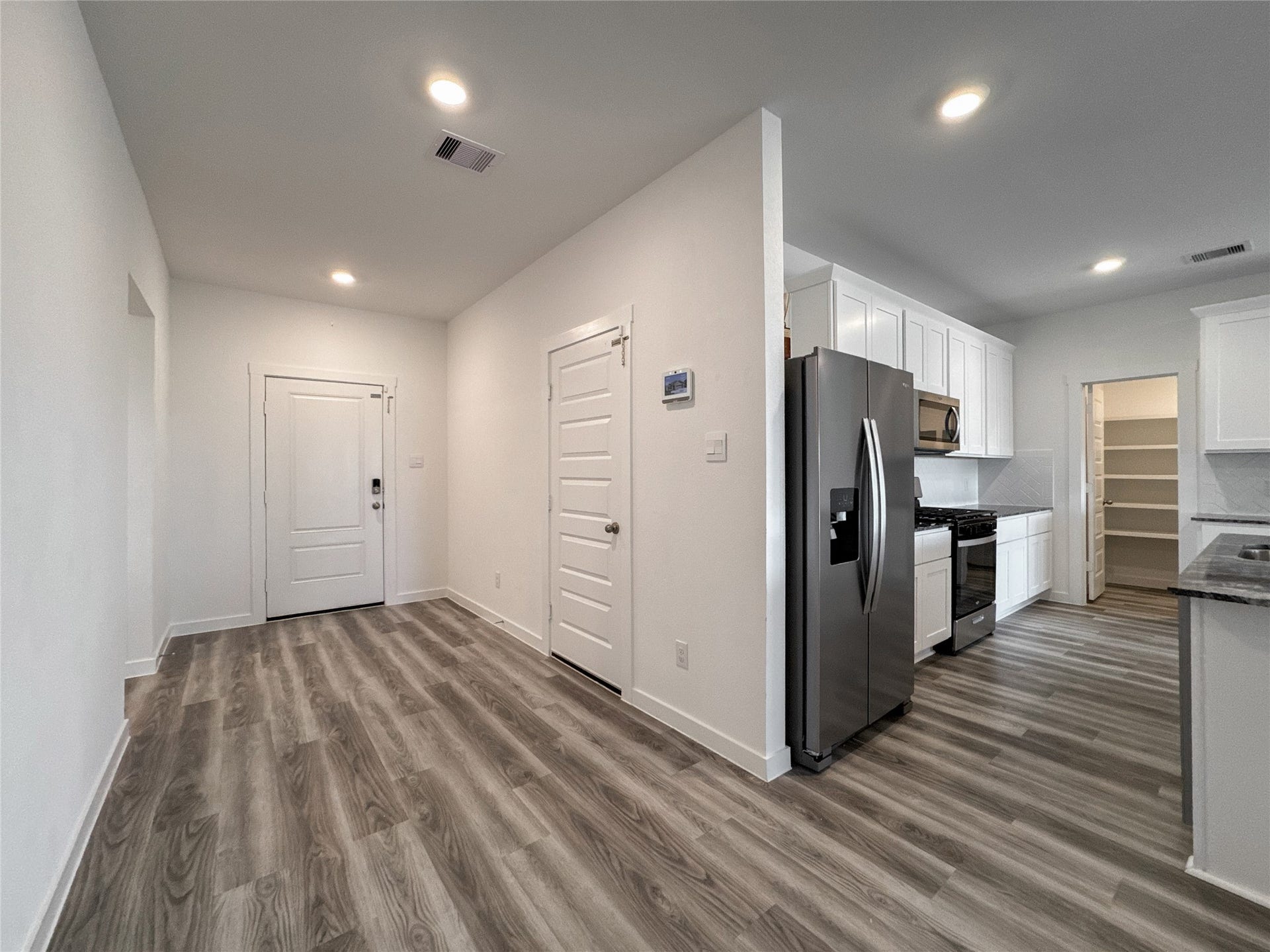8706 Marlow Drive, Texas City, TX 77591 Front door inside view, garage exit connected to Living Room and Kitchen