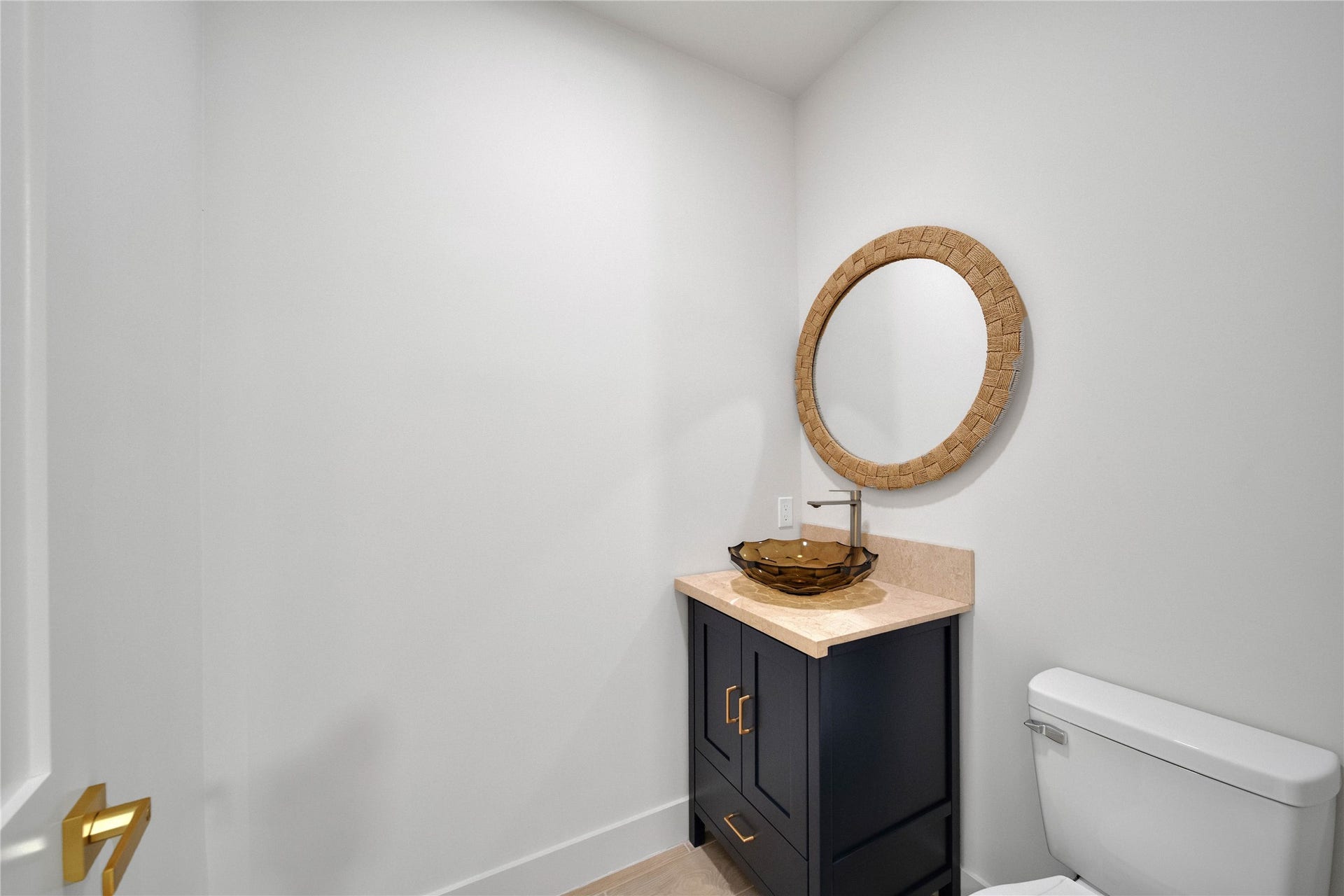 243 Bamaku Bend, Tiki Island, TX 77554 Convenient half bath located by the entertaining spaces for guest.
