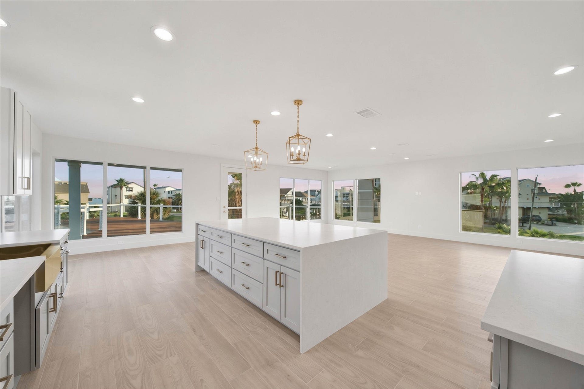 243 Bamaku Bend, Tiki Island, TX 77554 Spacious open-concept kitchen and dining area designed for easy everyday living and entertaining.