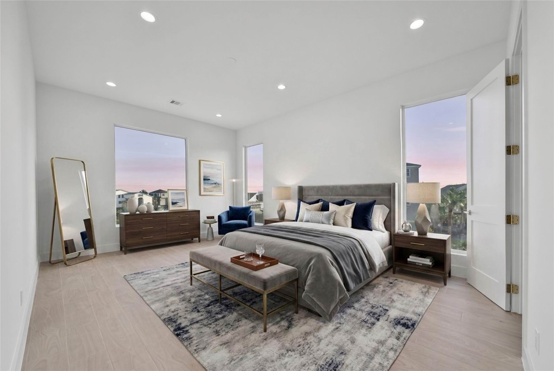 243 Bamaku Bend, Tiki Island, TX 77554 One of Four spacious secondary bedrooms offering light floors, high ceilings, recessed lighting, en suite and beautiful views. *virtually staged*