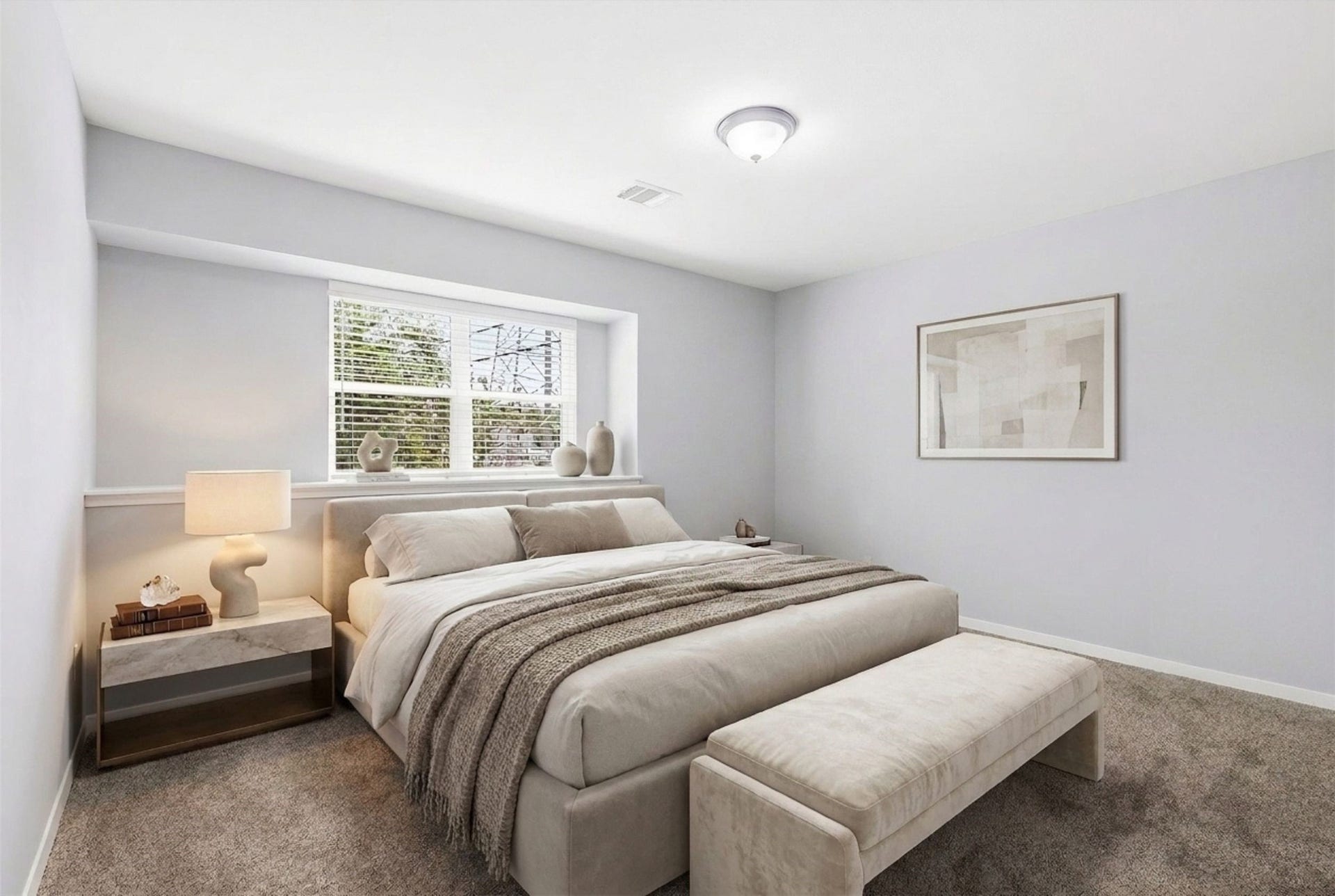 2503 Moss Hill Drive, Houston, TX 77080 Spacious room with soft carpeting and a large window that invites natural light, complemented by neutral walls and a modern ceiling fixture.