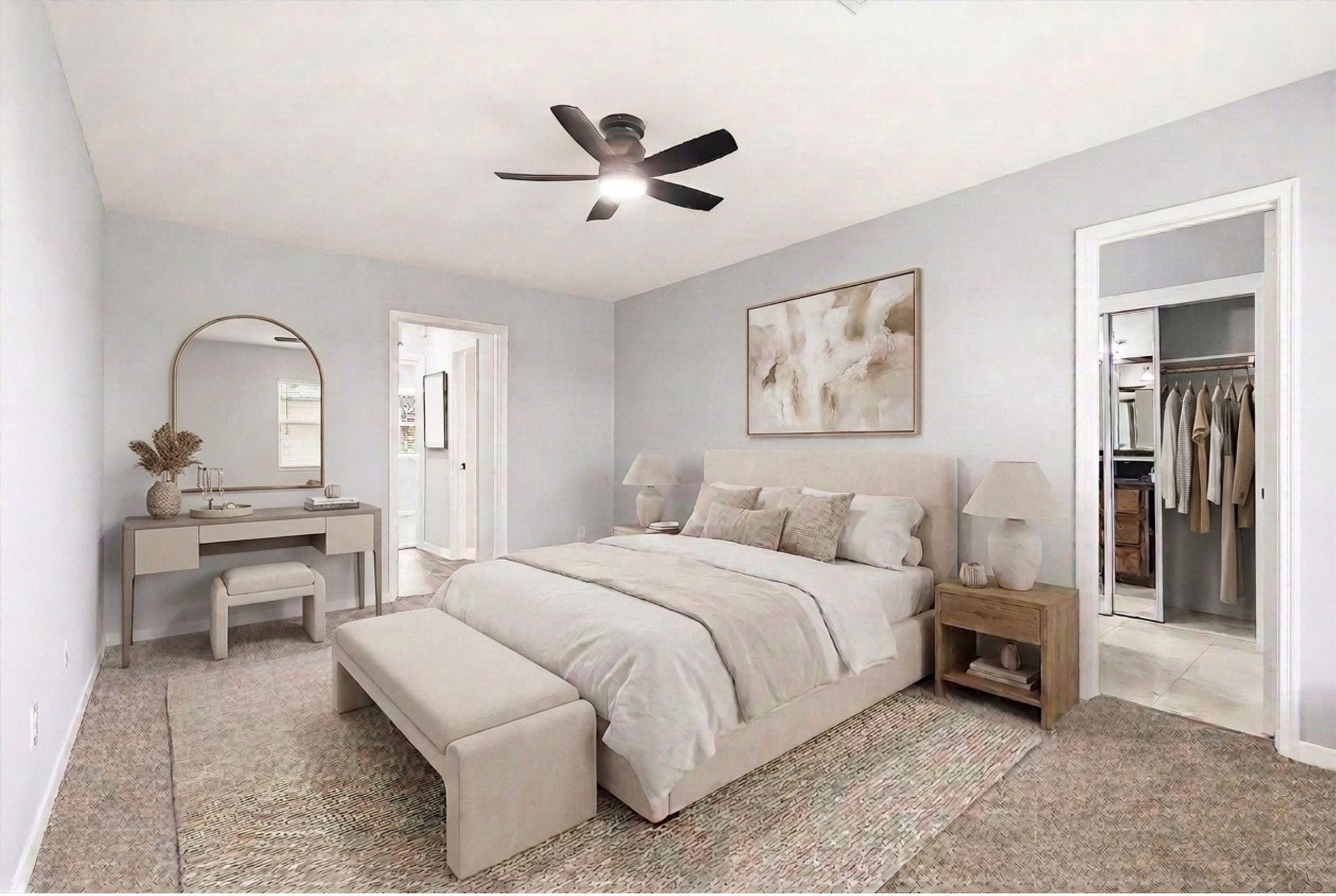 2503 Moss Hill Drive, Houston, TX 77080 Spacious primary bedroom with neutral tones features a stylish vanity, and a walk-in closet, creating a serene retreat. (Virtual Staging)