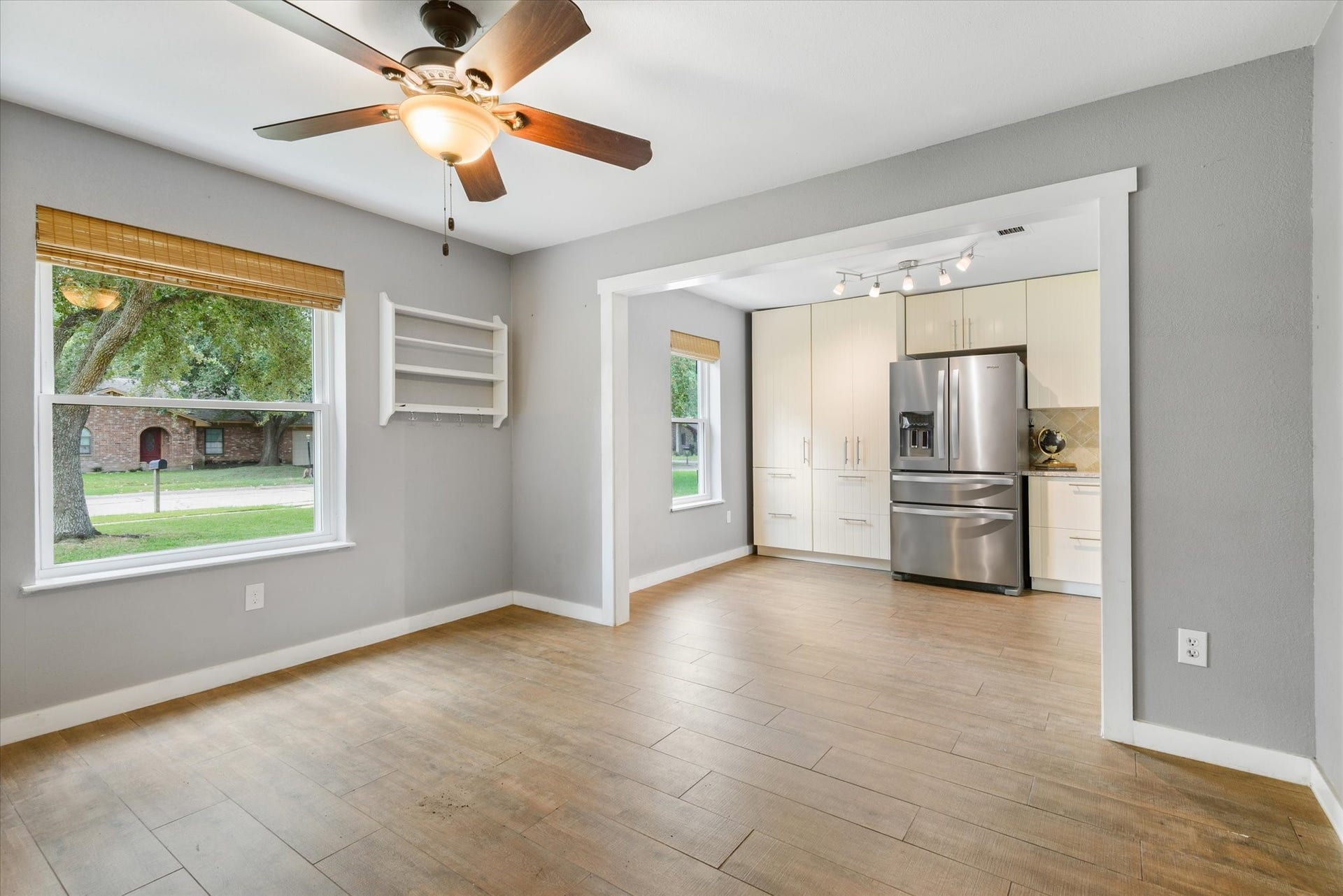 15811 Wandering Trail, Friendswood, TX 77546 Replaced windows throughout the home and wood look tile replaced here in dining and kitchen.